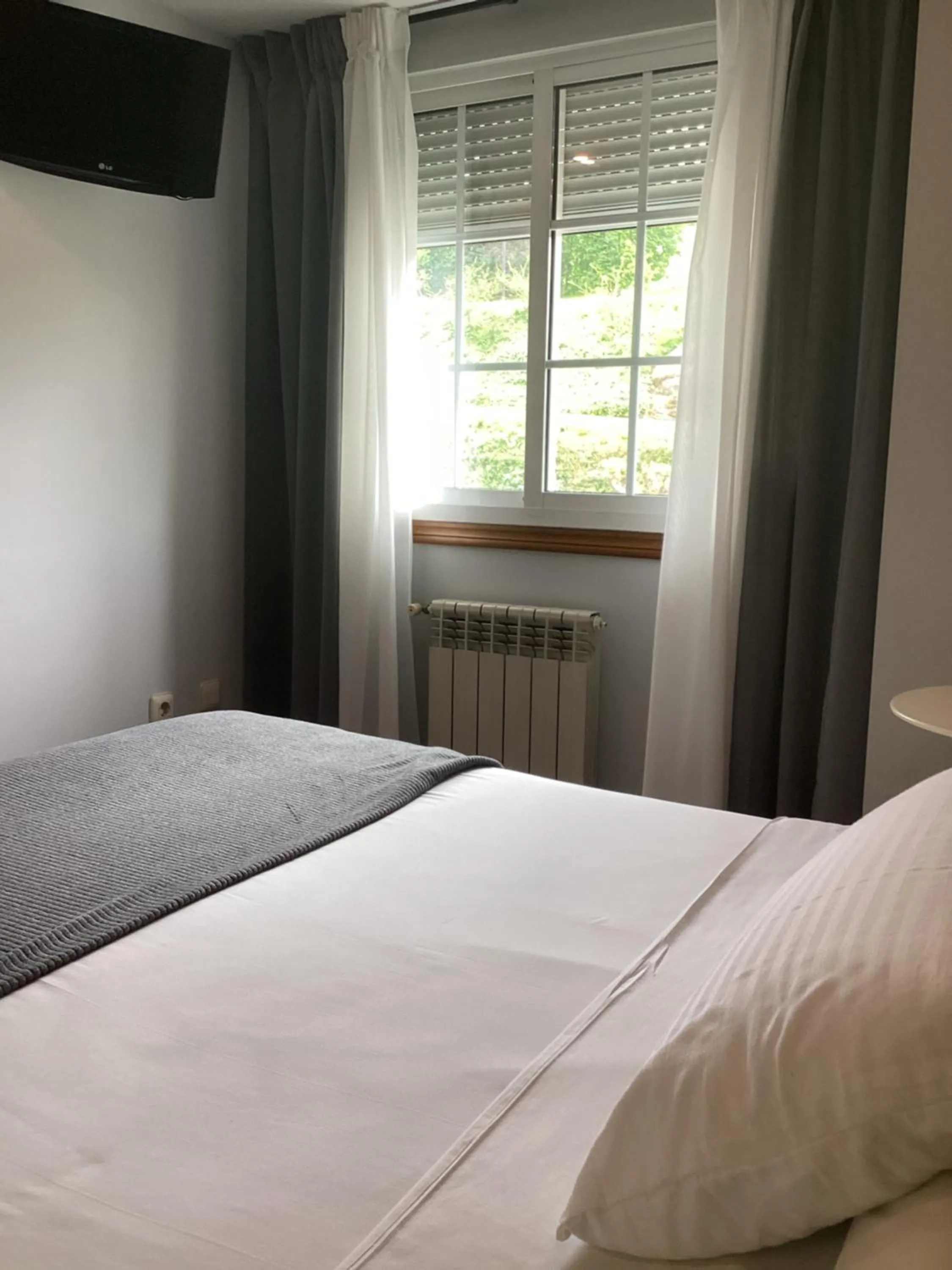 Bed in Saudade Hostal Cafetería