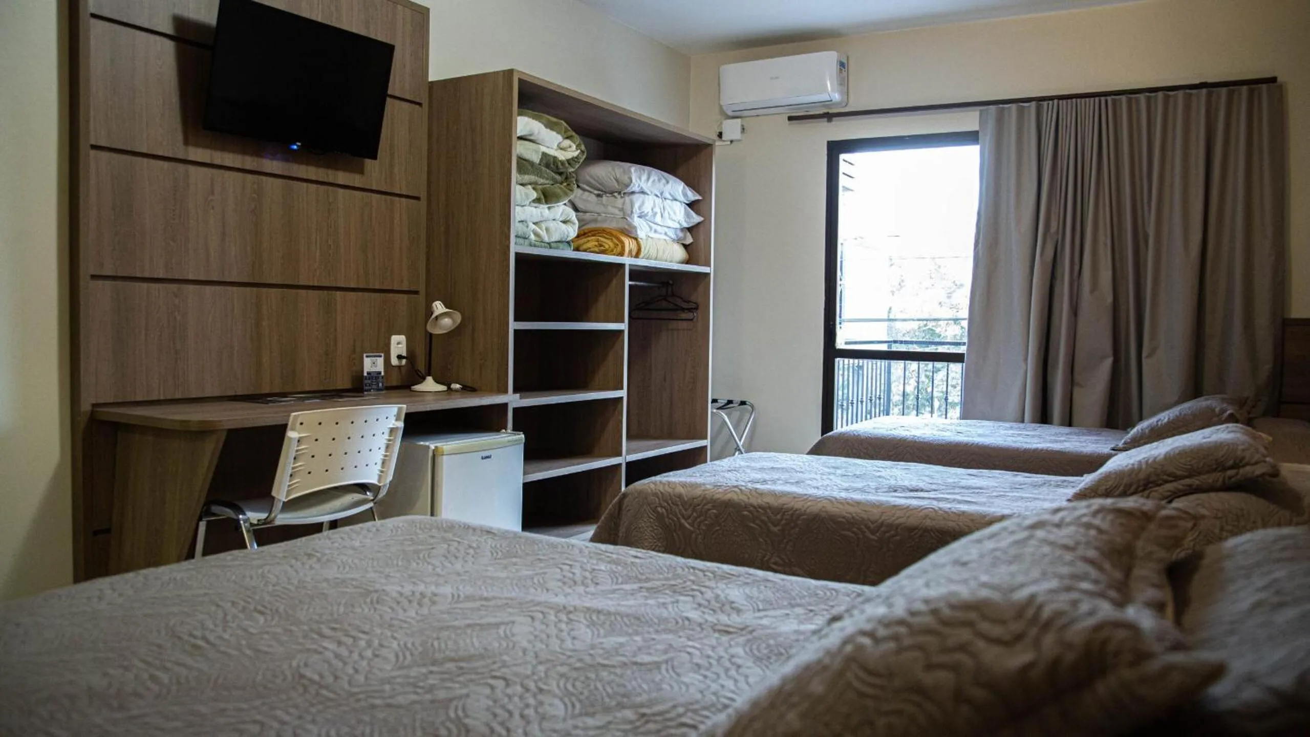 Luxury Triple Room in Hotel Fiorio