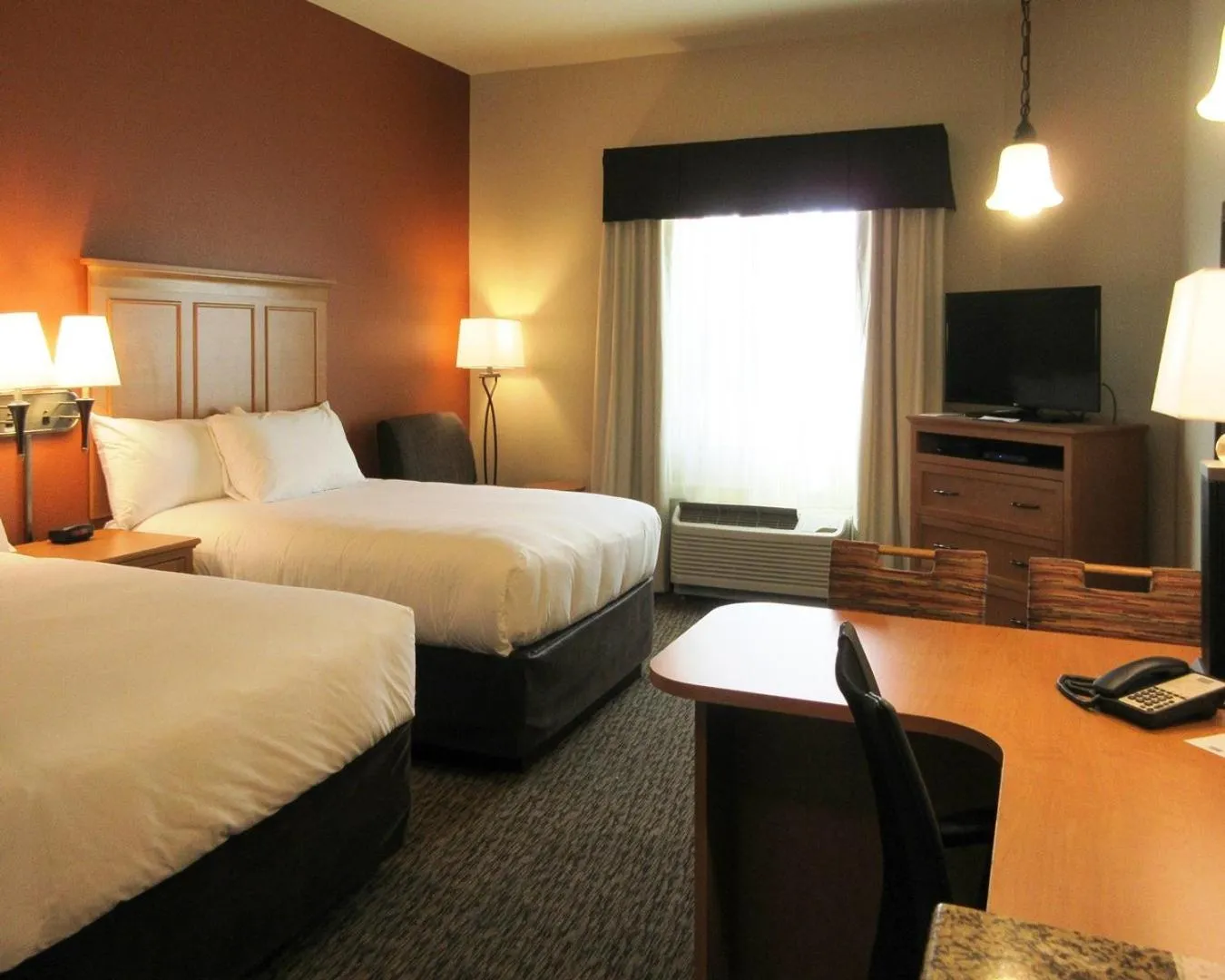 Bed in MainStay Suites Sidney - Medical Center