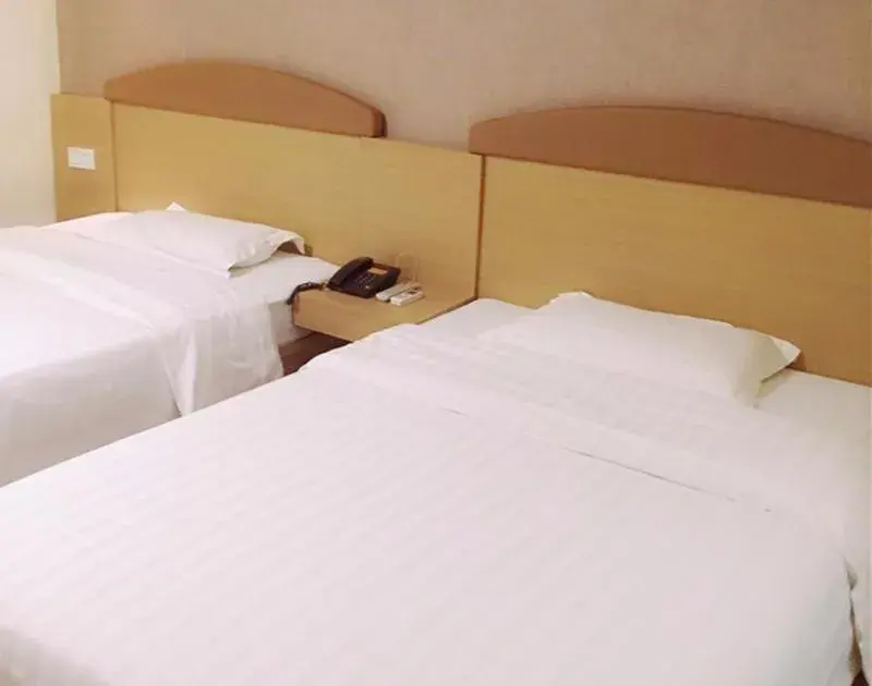 Bed in 7Days Inn Wuchang Railway Subway Station Bed in 7Days Inn Wuchang Railway Subway Station