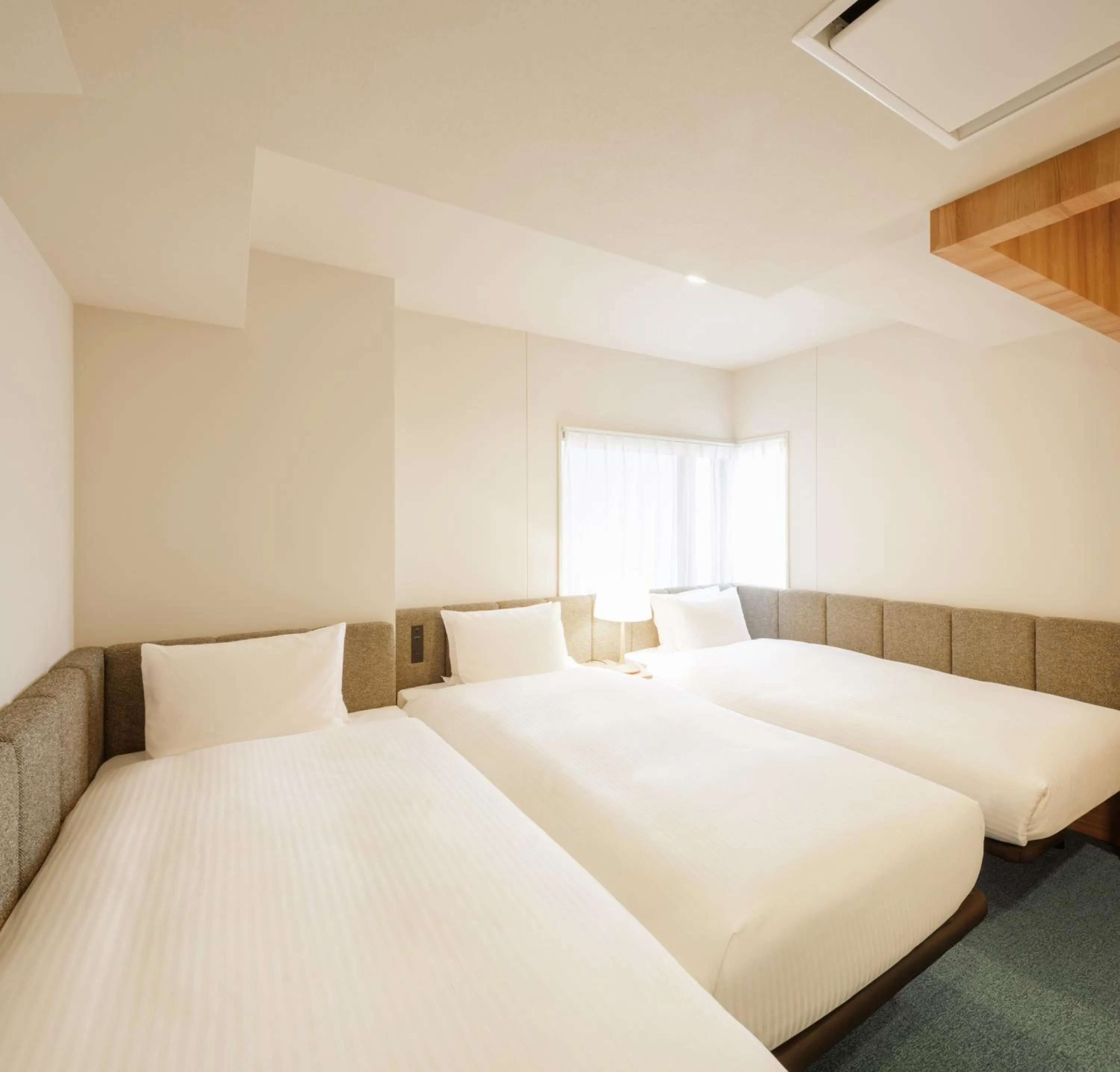 Bed in HOTEL AMANEK Asakusa Sakurabashi