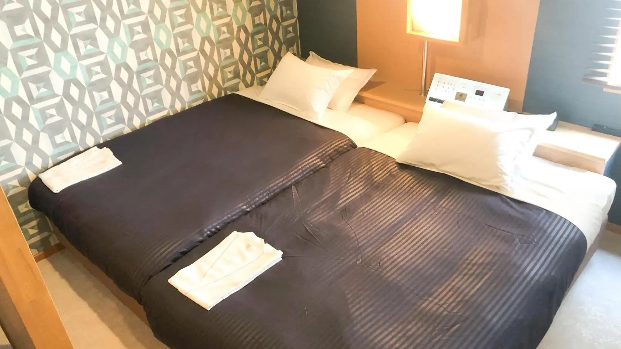 Twin Room - single occupancy - Non-Smoking in Hotel Livemax Kuroishi Twin Room - single occupancy - Non-Smoking in Hotel Livemax Kuroishi