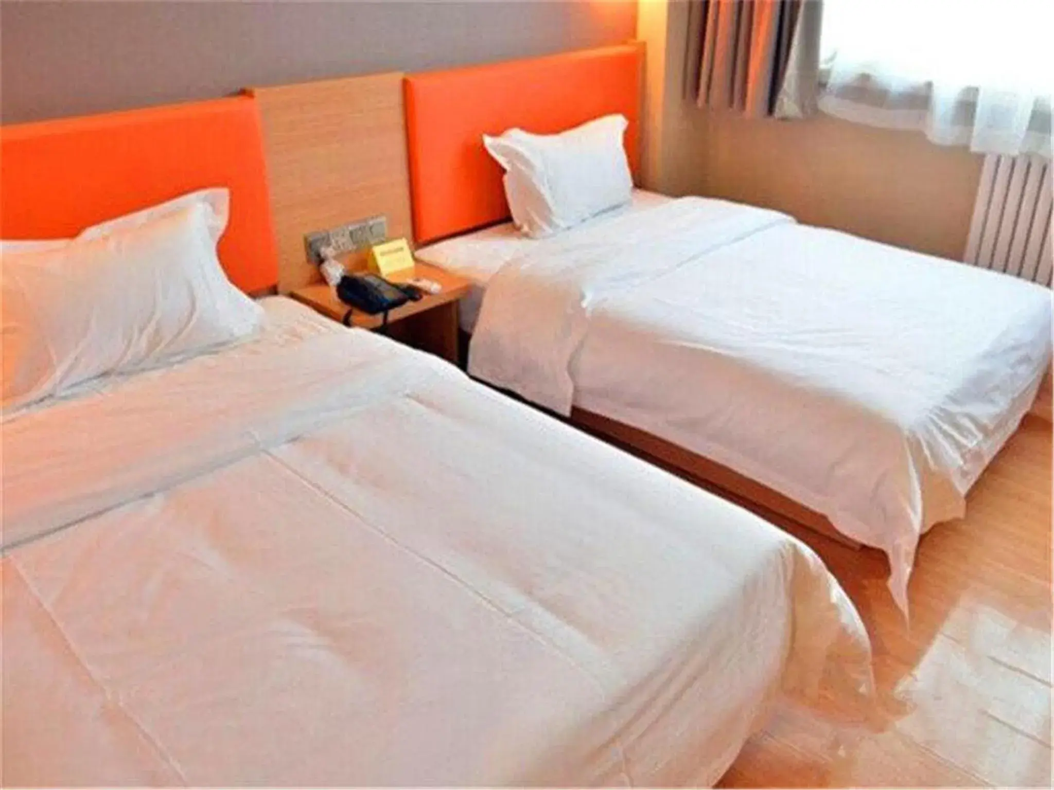 Bed in IU Hotel Beijing West Coach Station Liuliqiao East Metro Station Bed in IU Hotel Beijing West Coach Station Liuliqiao East Metro Station