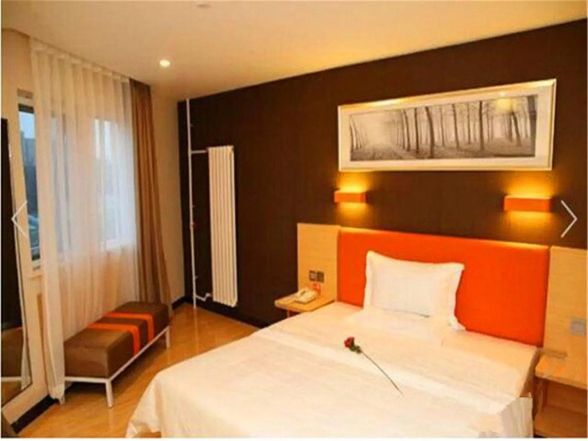 Decorative detail, Bed in IU Hotel Beijing West Coach Station Liuliqiao East Metro Station Decorative detail, Bed in IU Hotel Beijing West Coach Station Liuliqiao East Metro Station