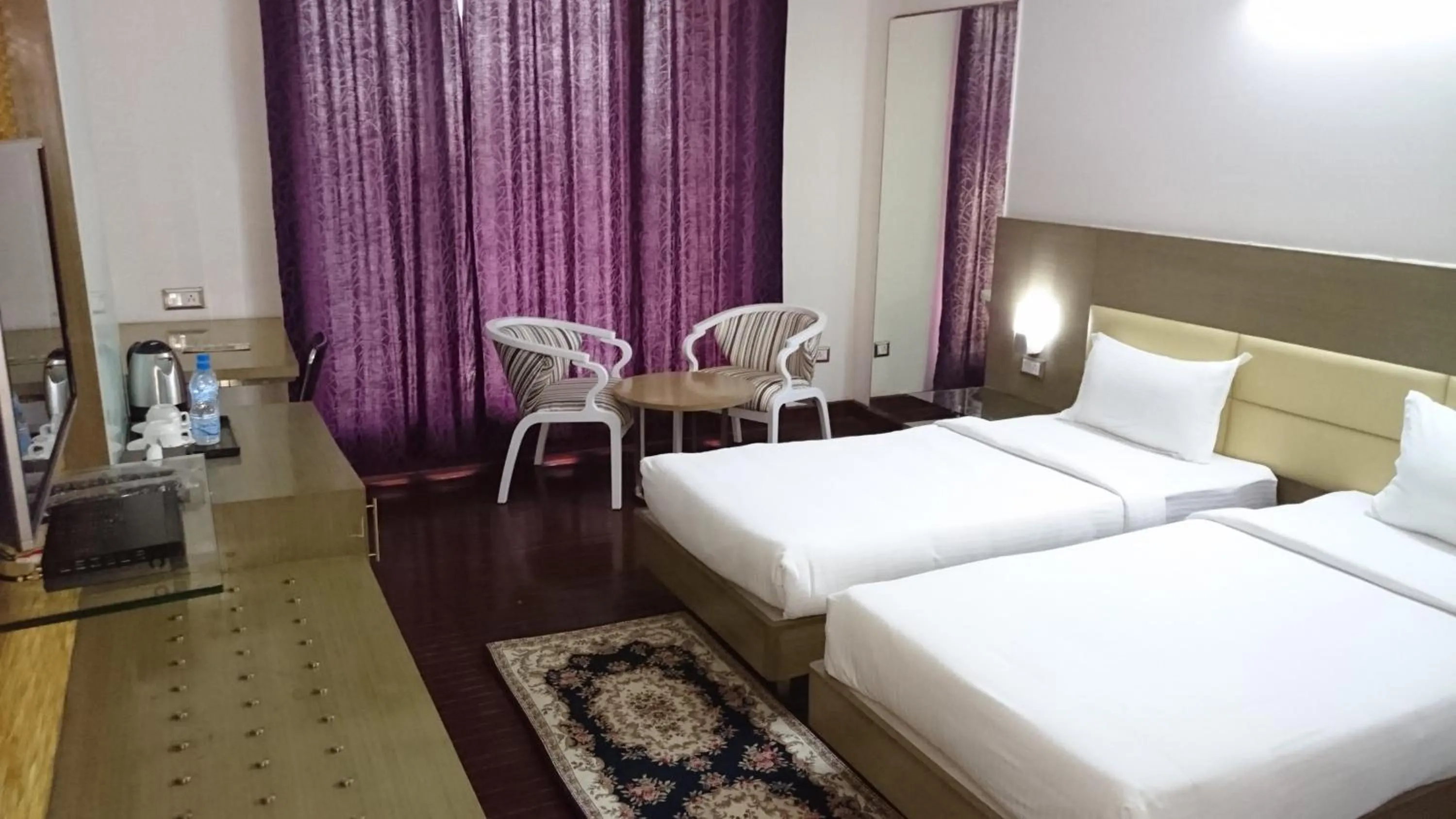 Bed in Rosewood International Hotel