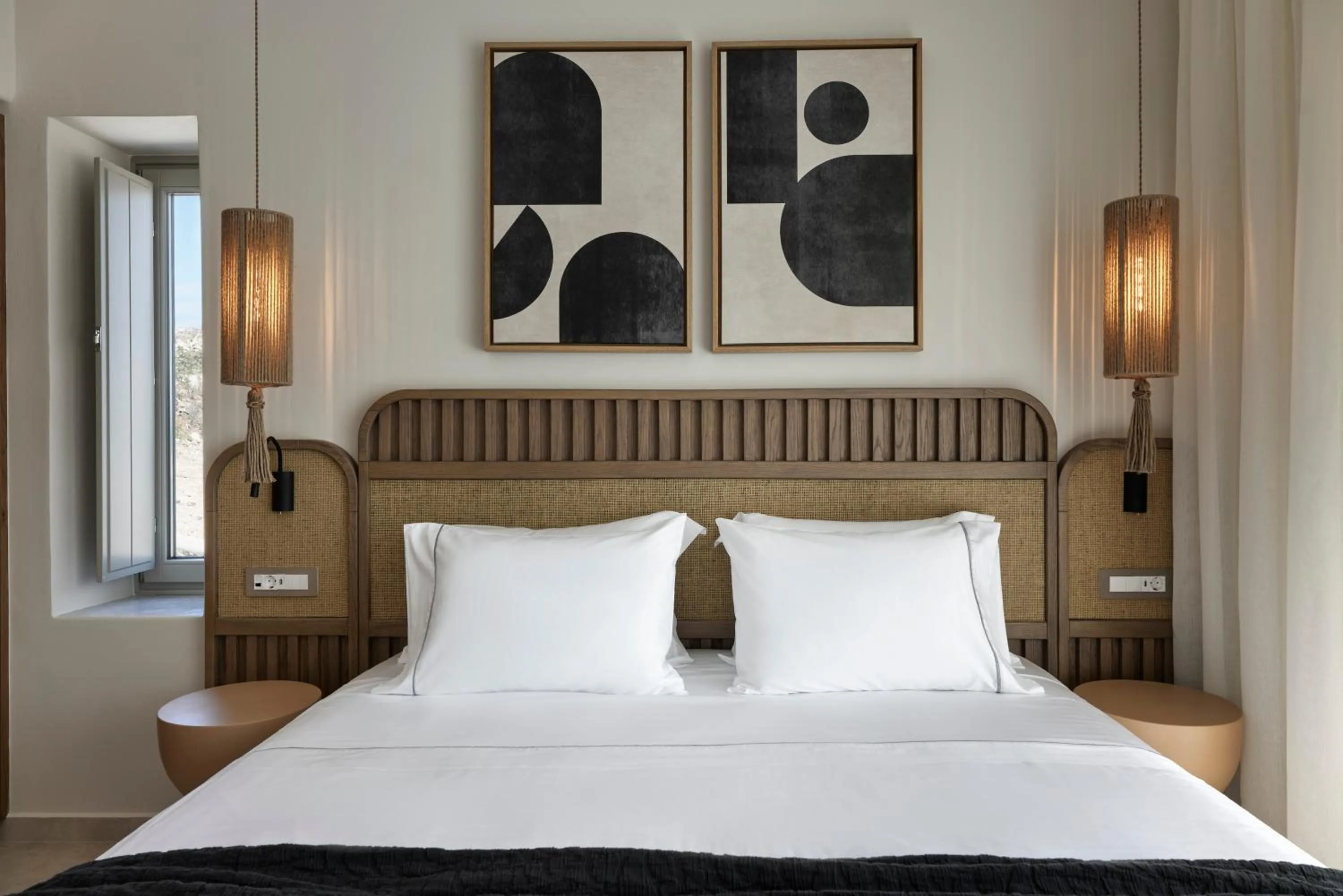 Bed in Apanemo Hotel & Suites