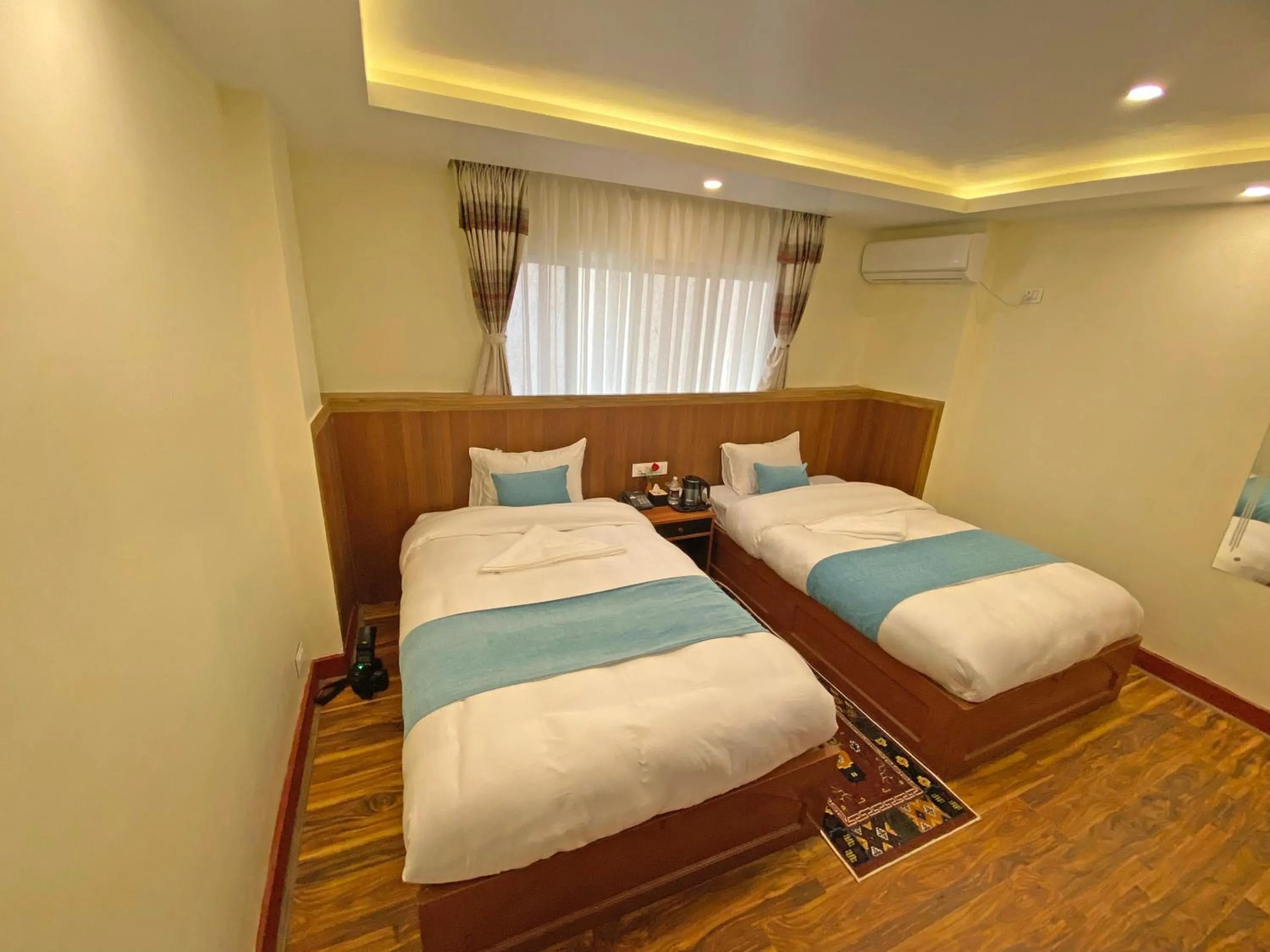 Bed in Hotel Himalayan BTS