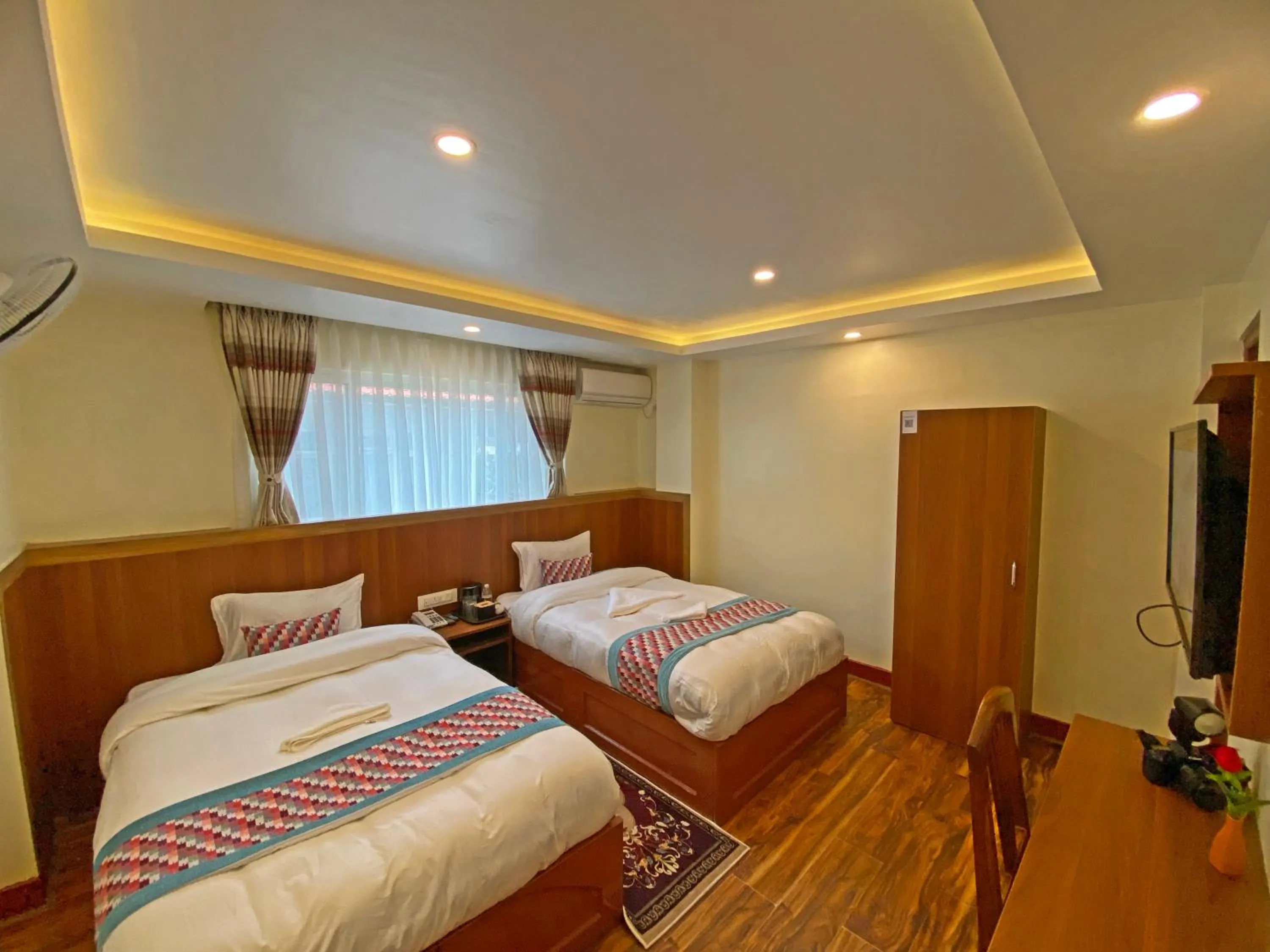 Bed in Hotel Himalayan BTS