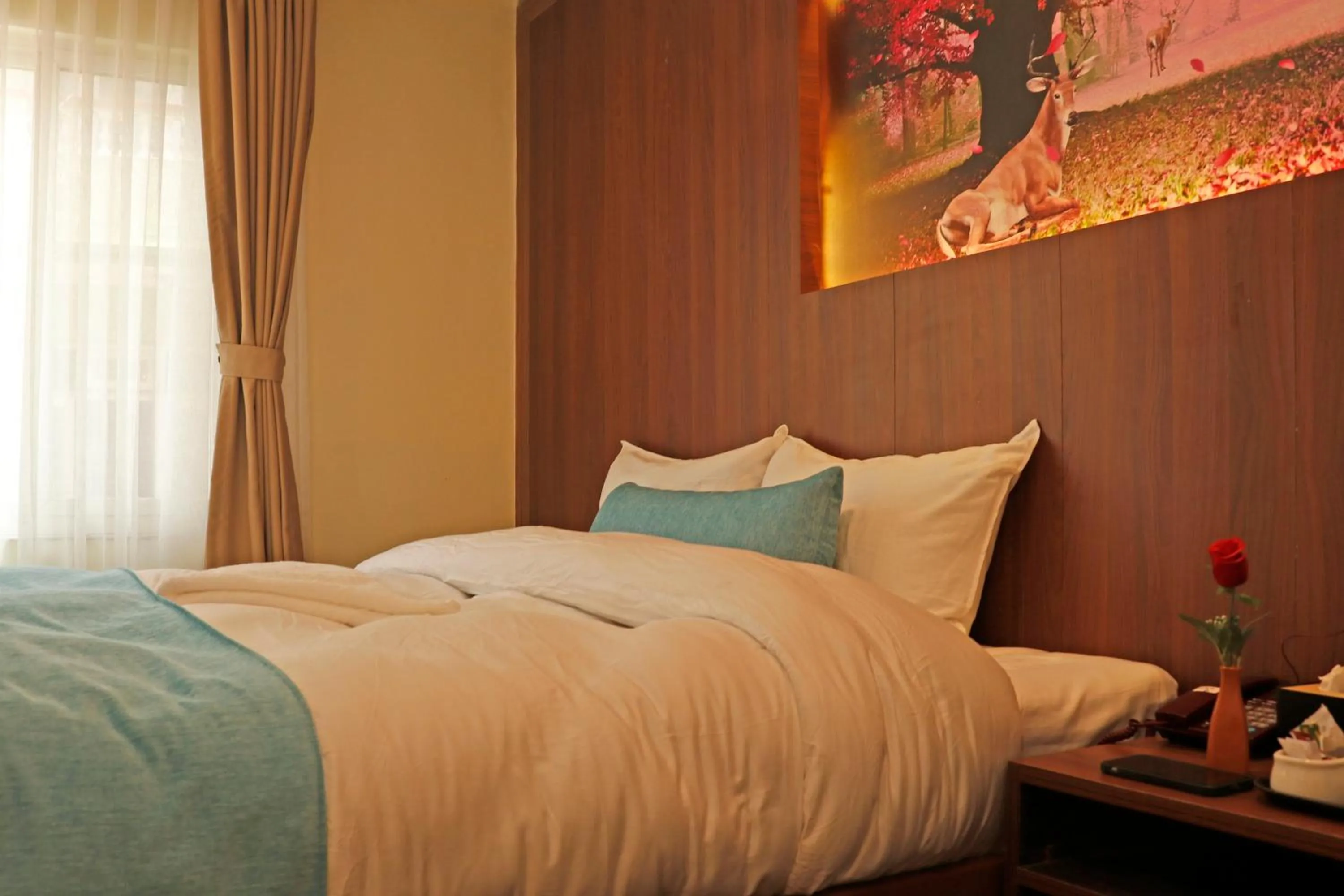 Bed in Hotel Himalayan BTS