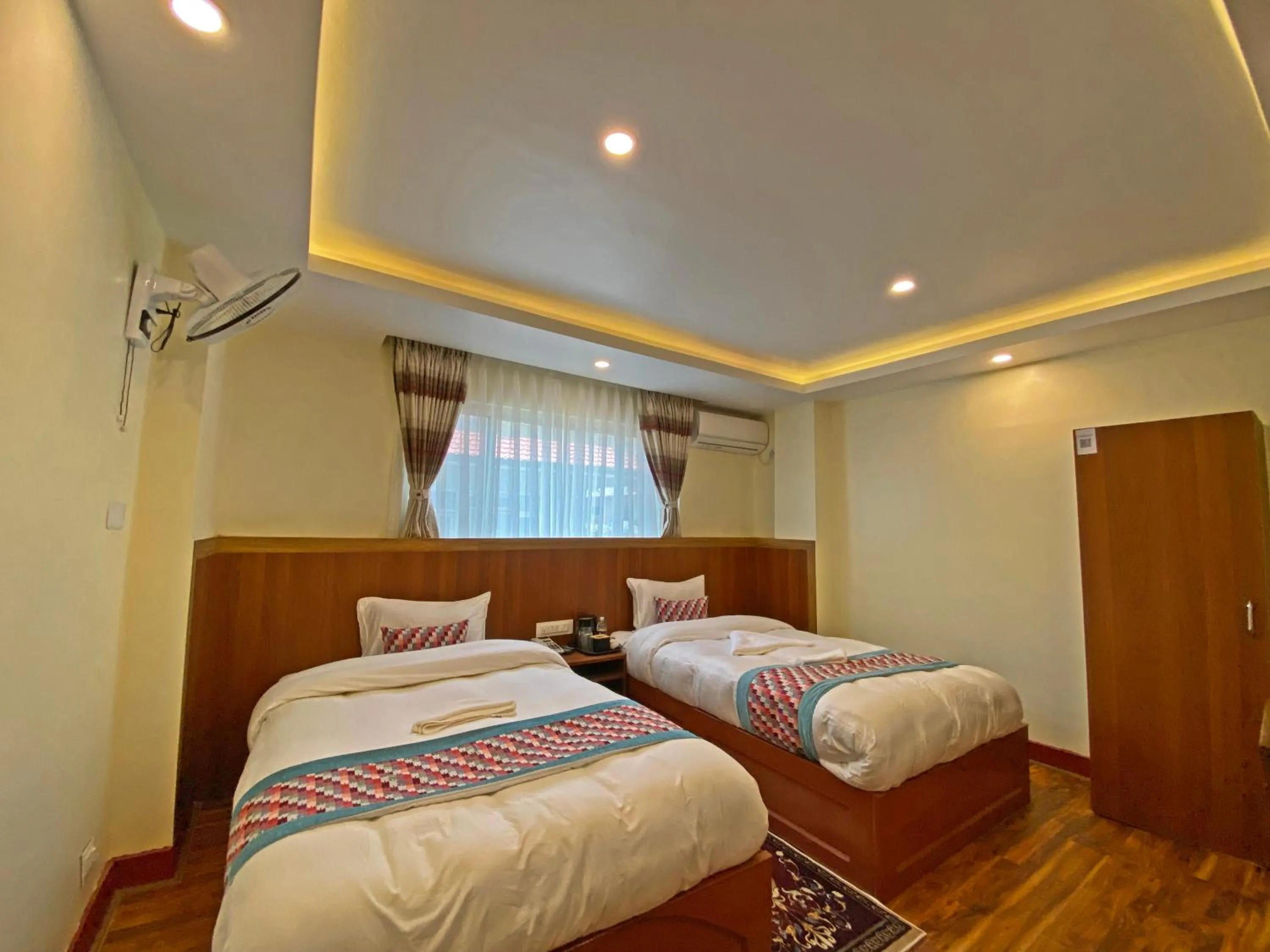 Bed in Hotel Himalayan BTS