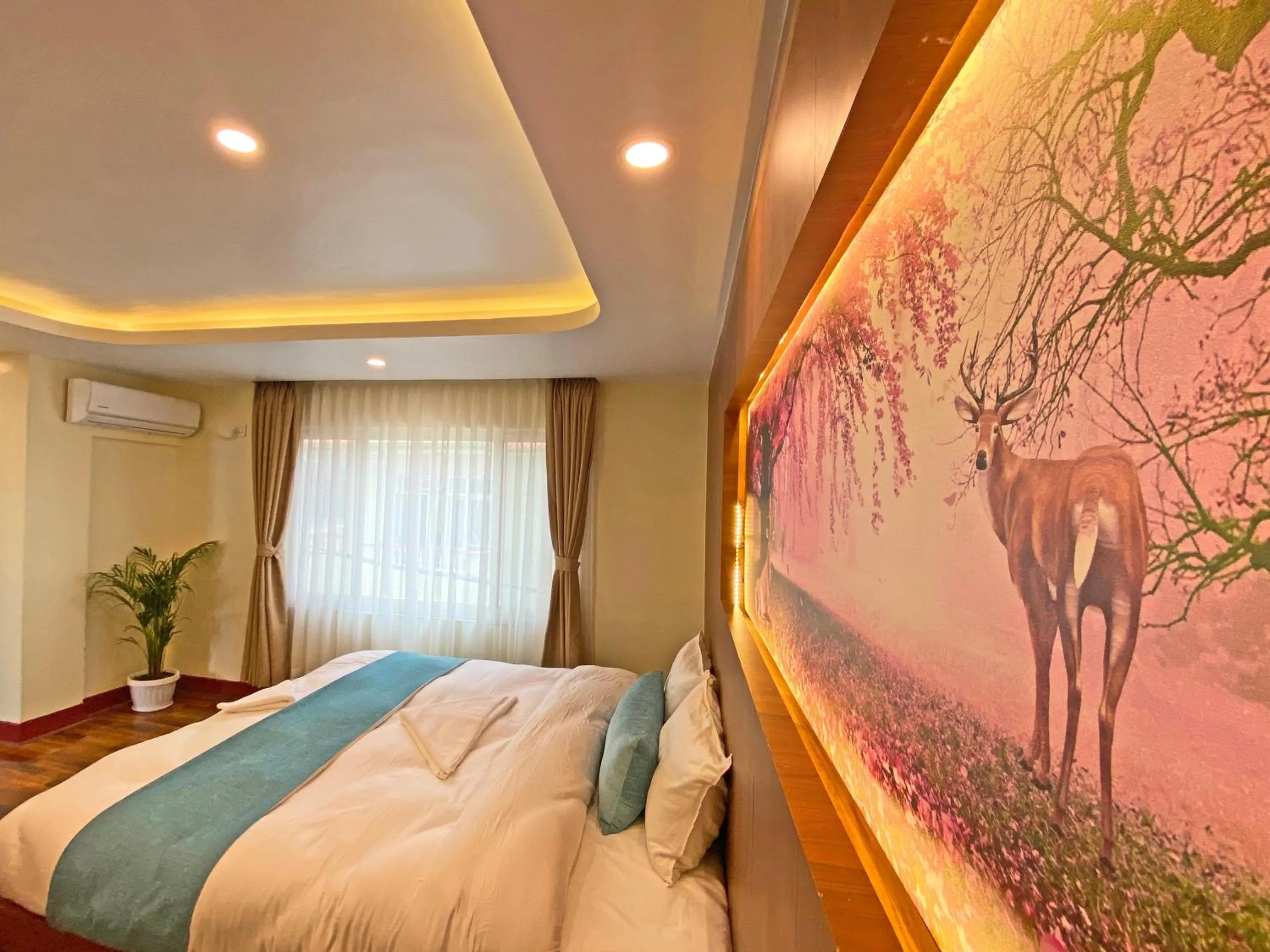 Bed in Hotel Himalayan BTS