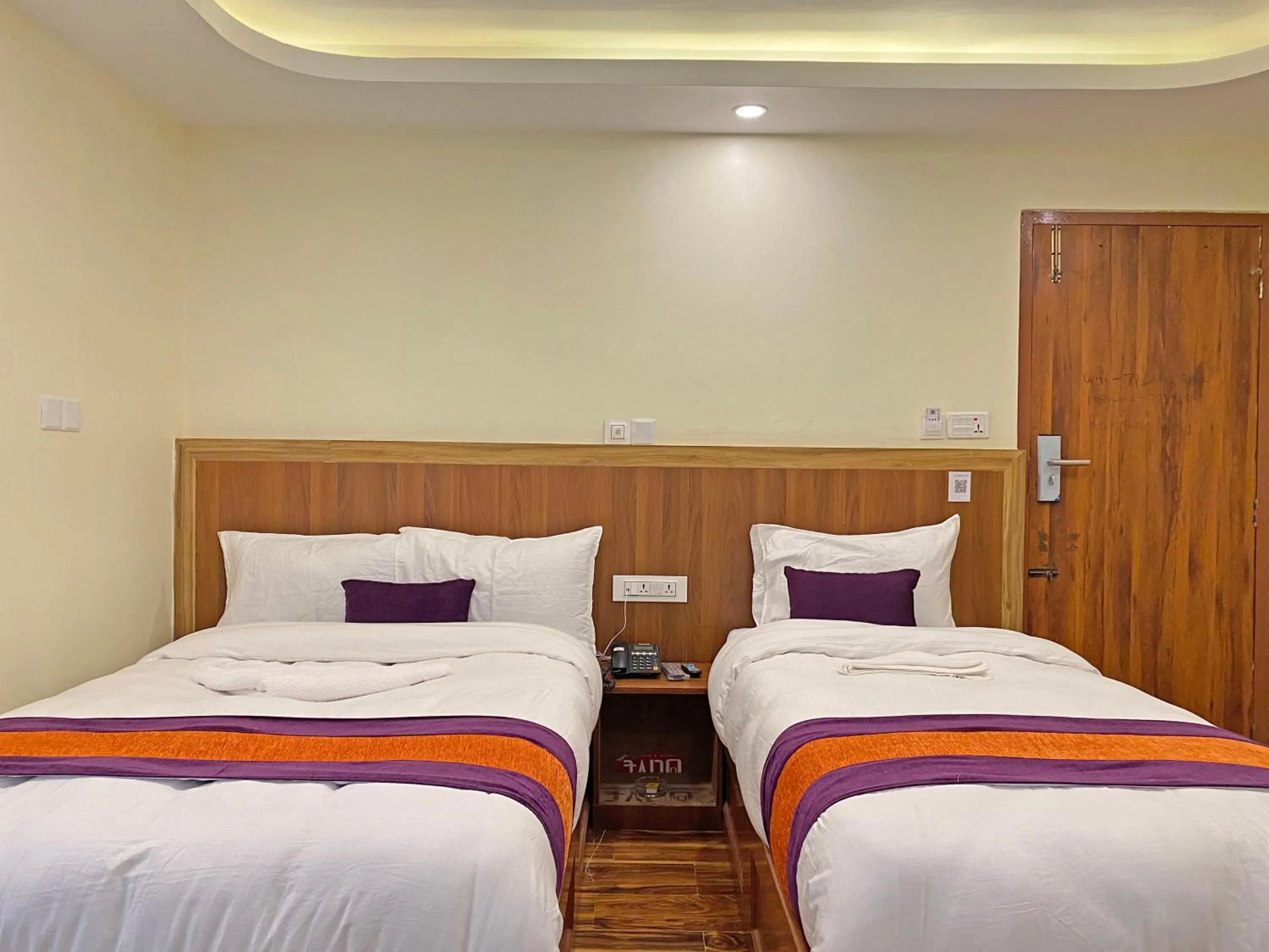 Bed in Hotel Himalayan BTS