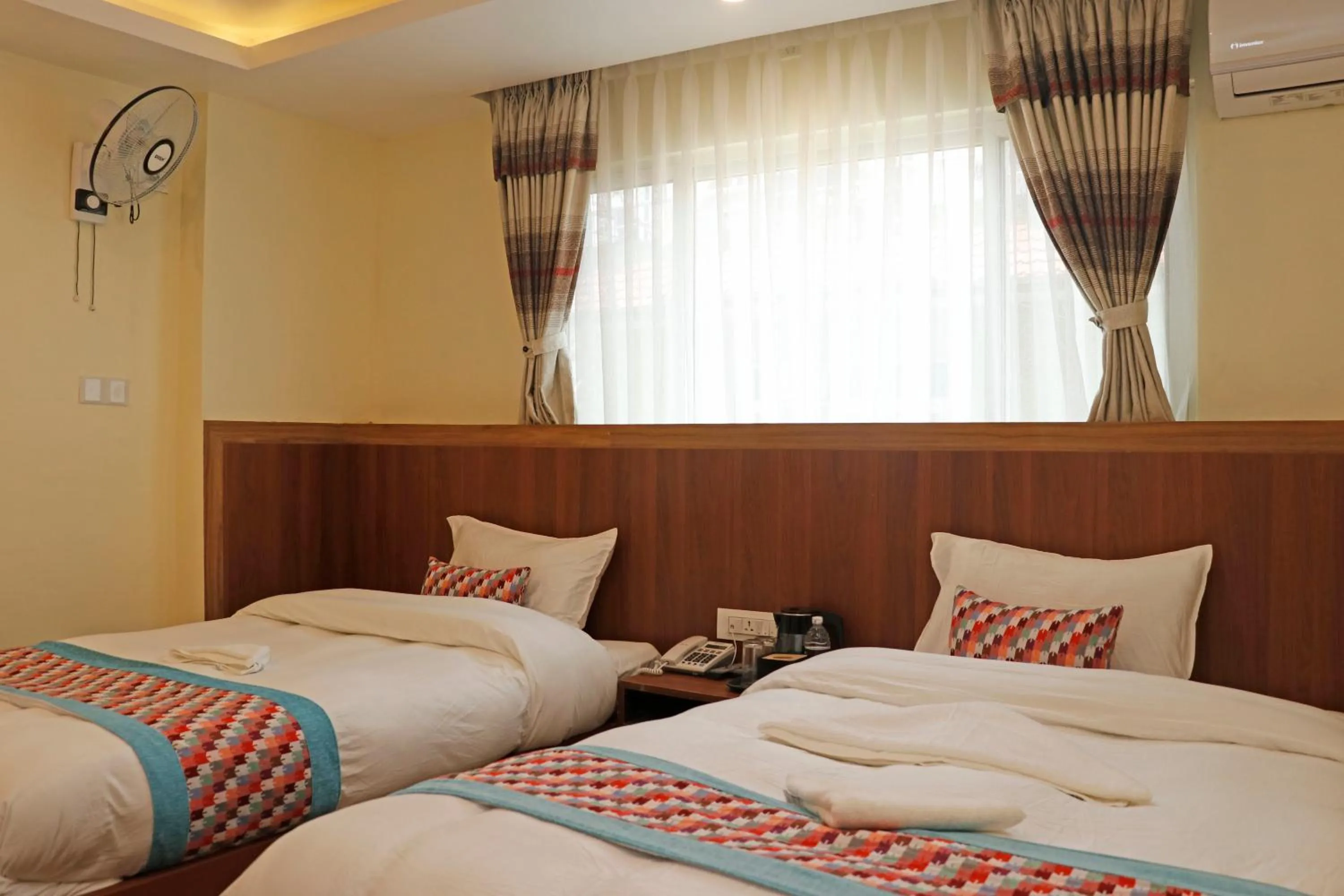 Bed in Hotel Himalayan BTS