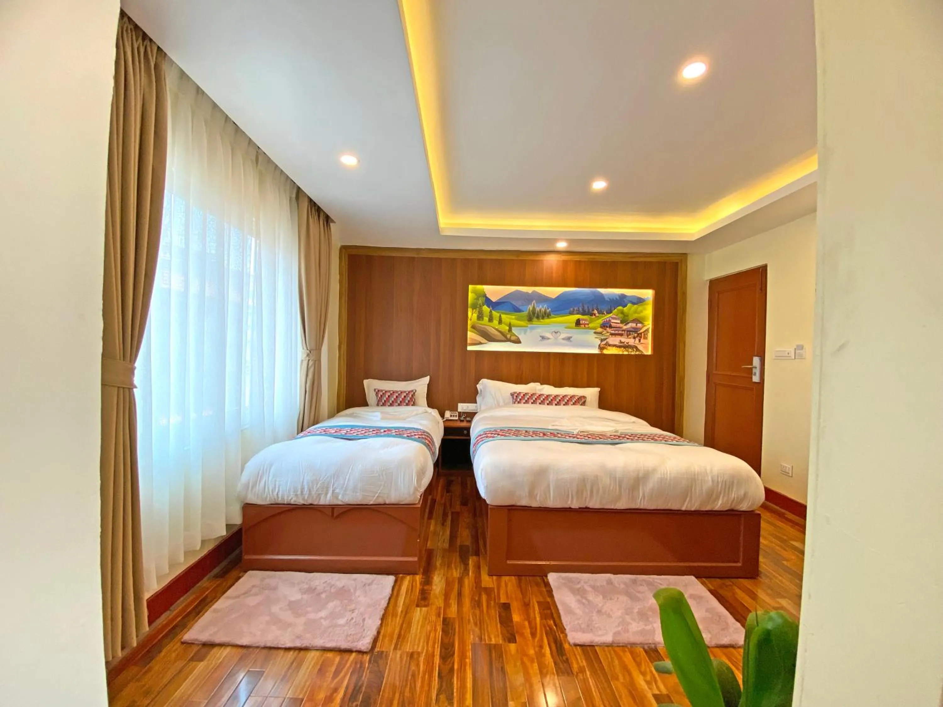 Bed in Hotel Himalayan BTS