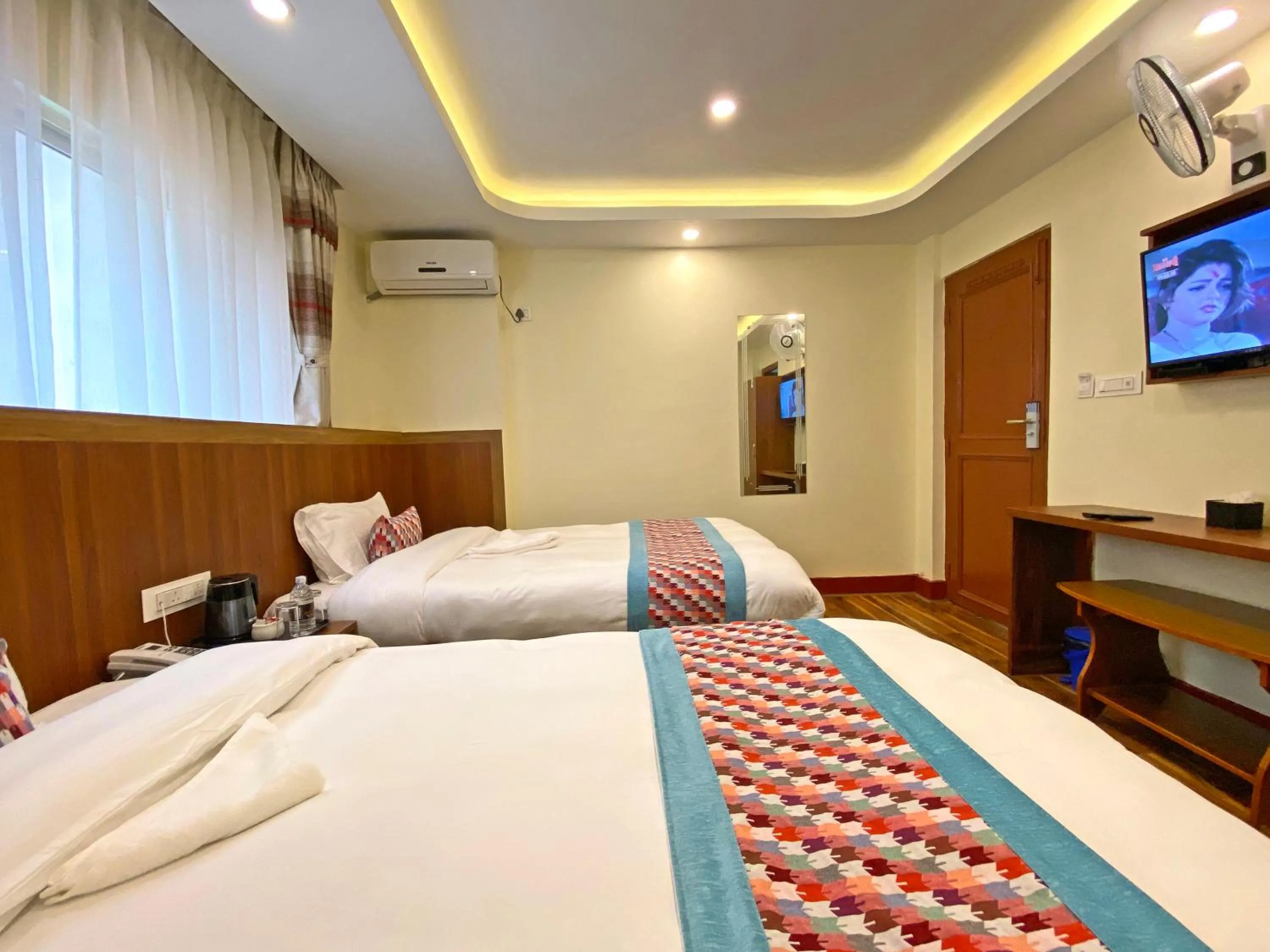 Bed in Hotel Himalayan BTS