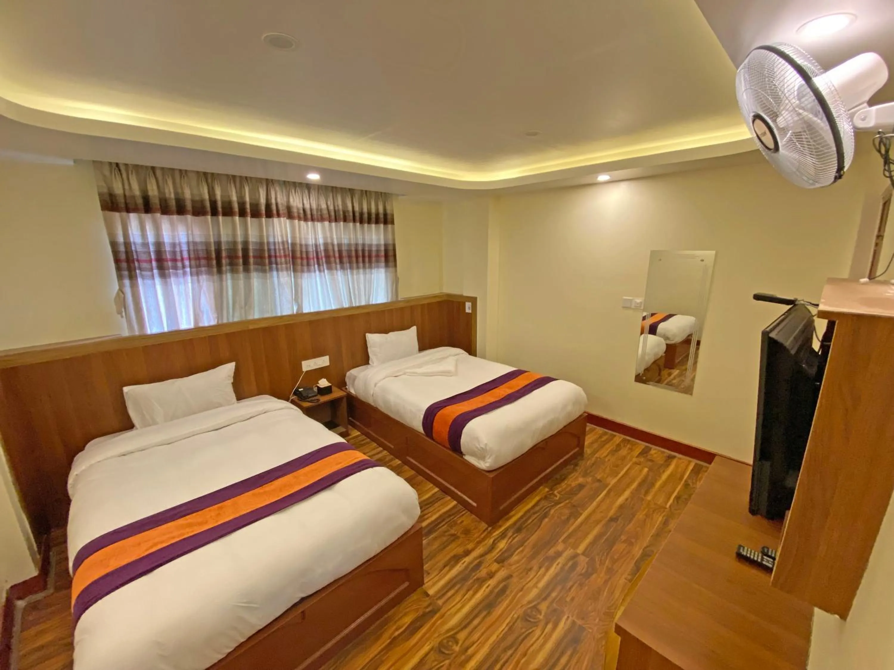 Bed in Hotel Himalayan BTS