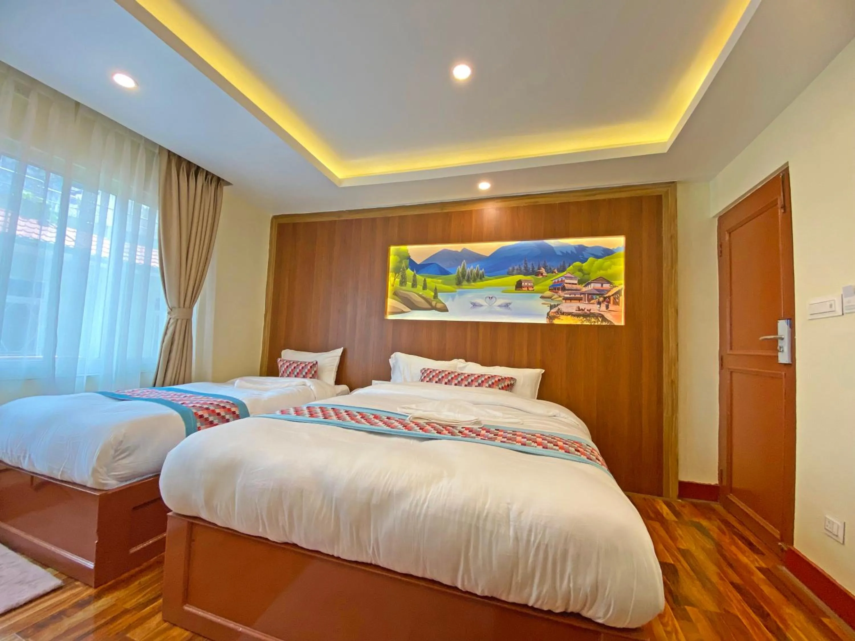 Bed in Hotel Himalayan BTS