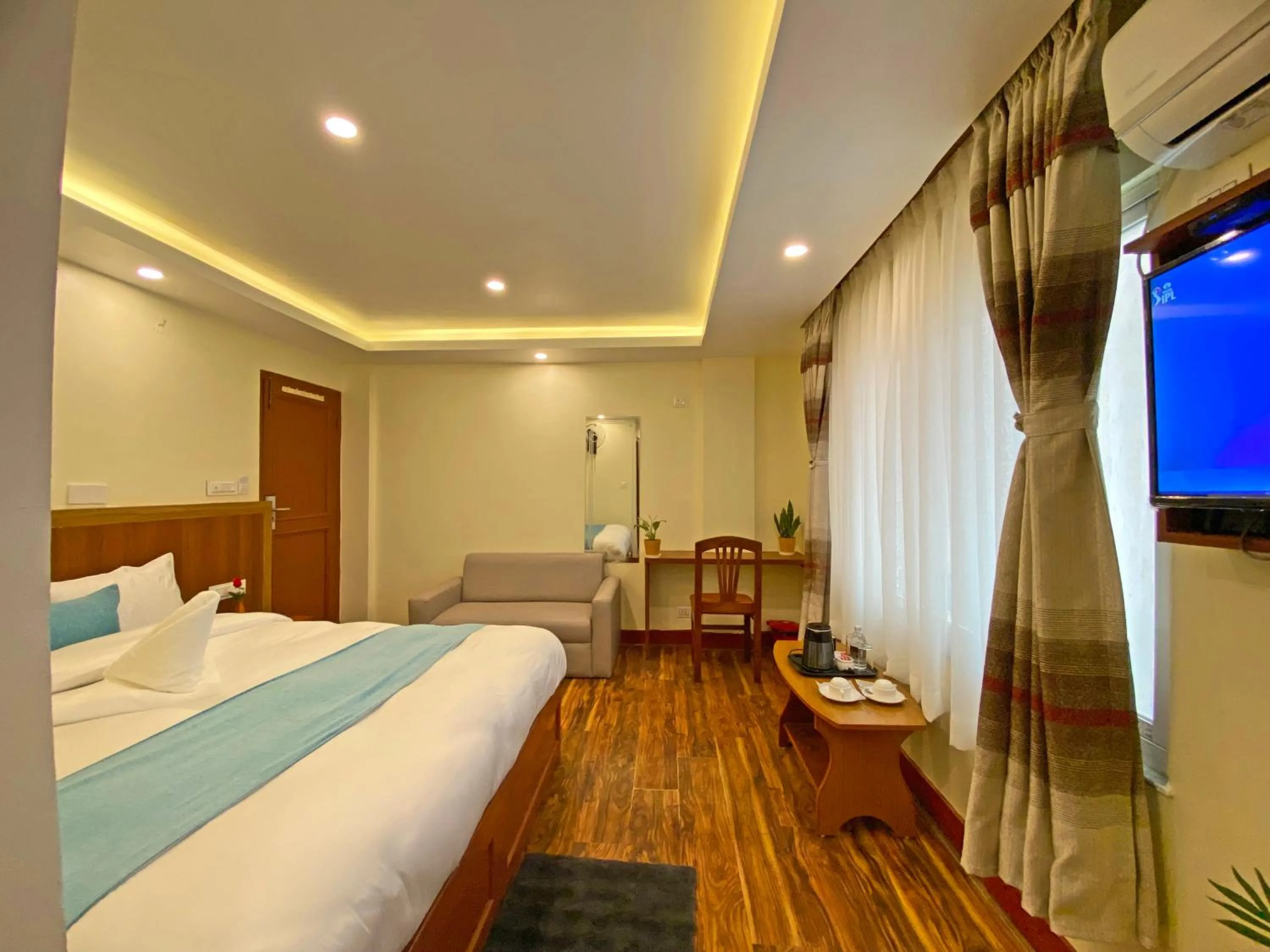 Bed in Hotel Himalayan BTS
