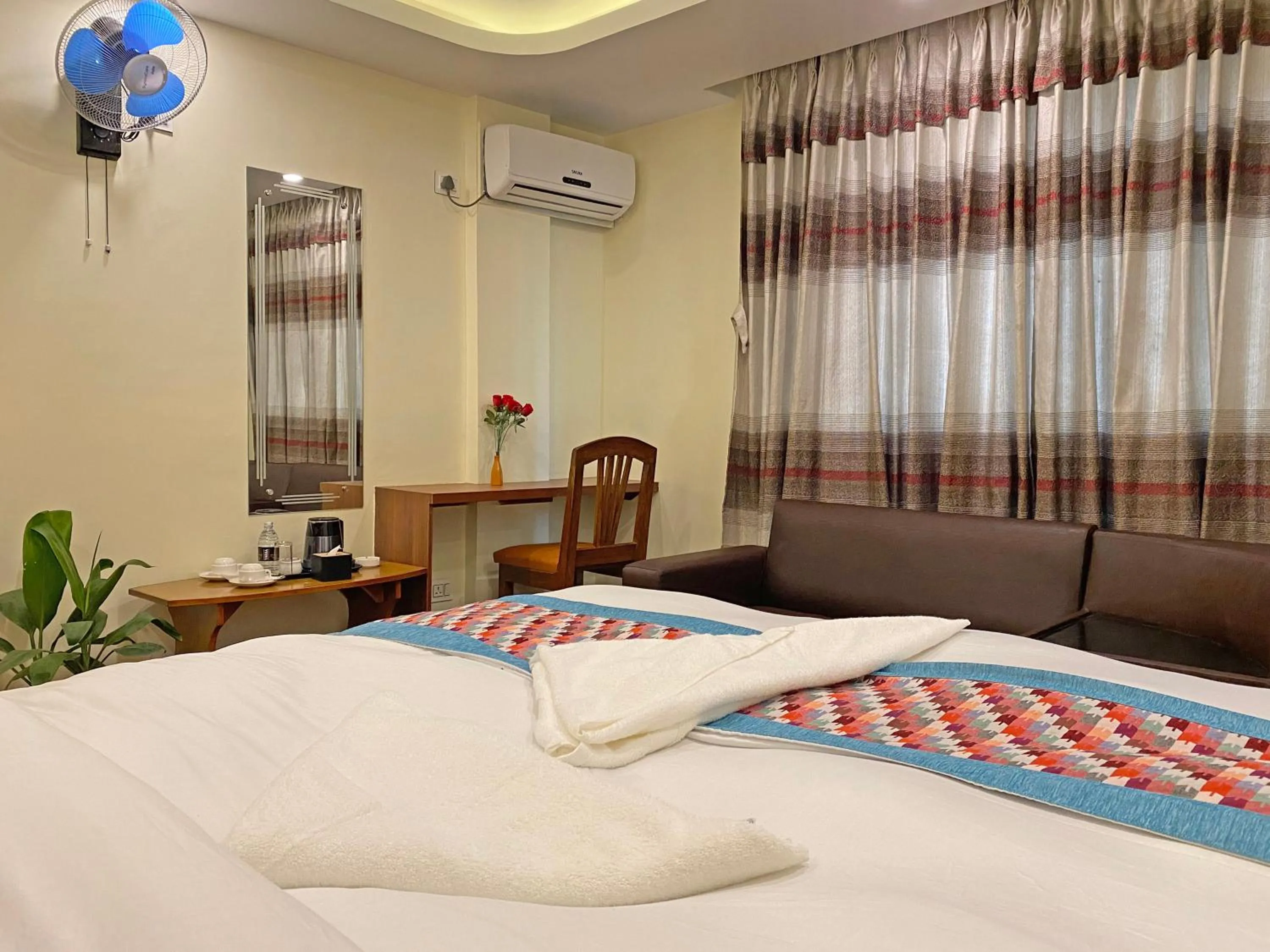 Bed in Hotel Himalayan BTS