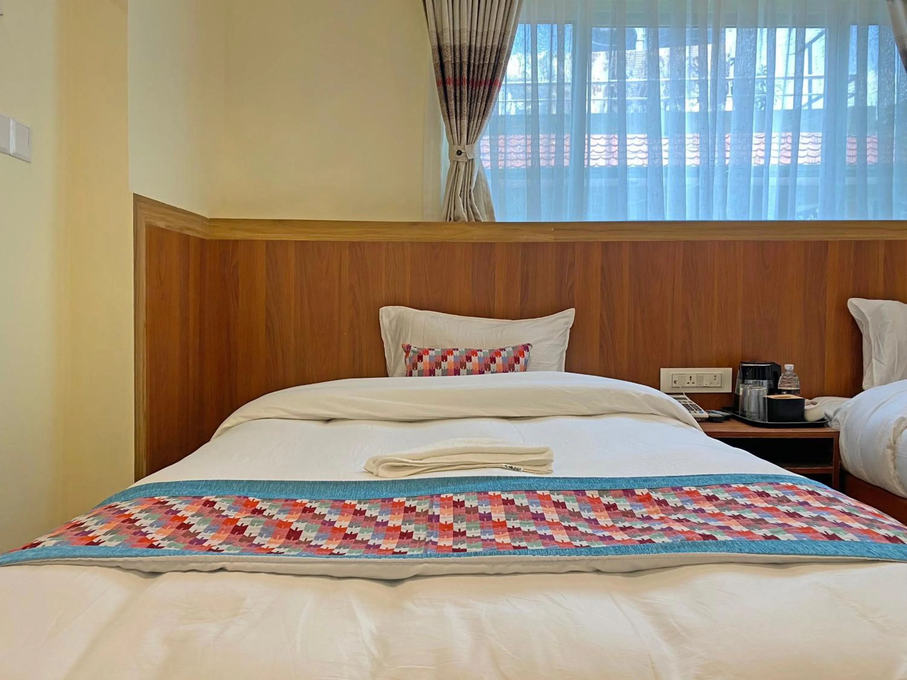 Bed in Hotel Himalayan BTS