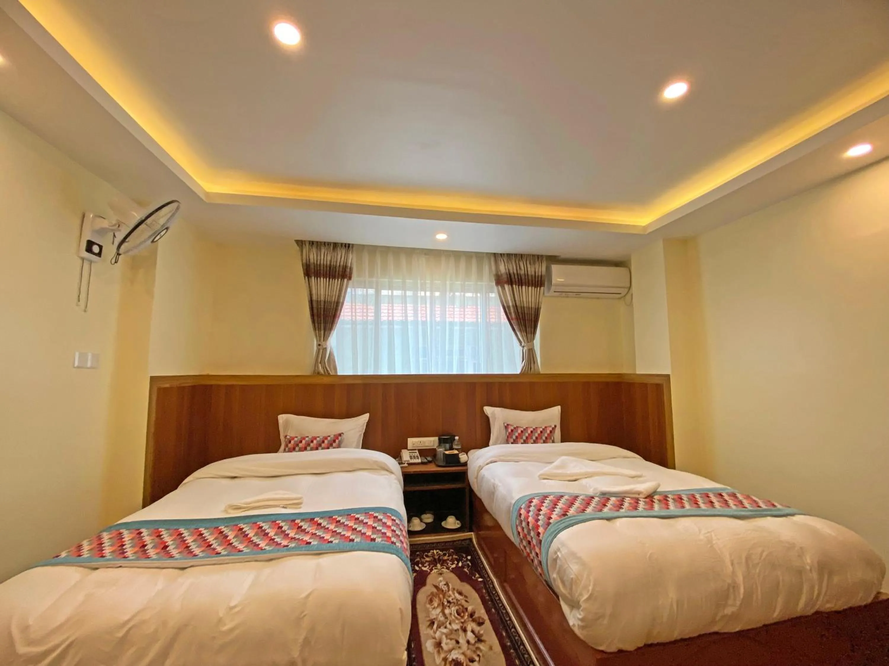 Bed in Hotel Himalayan BTS
