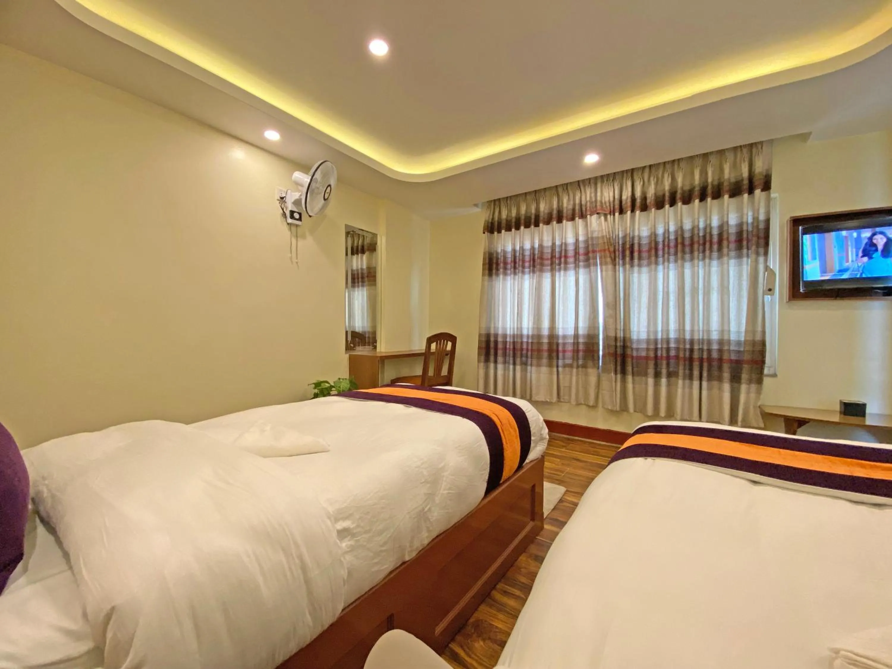 Bed in Hotel Himalayan BTS