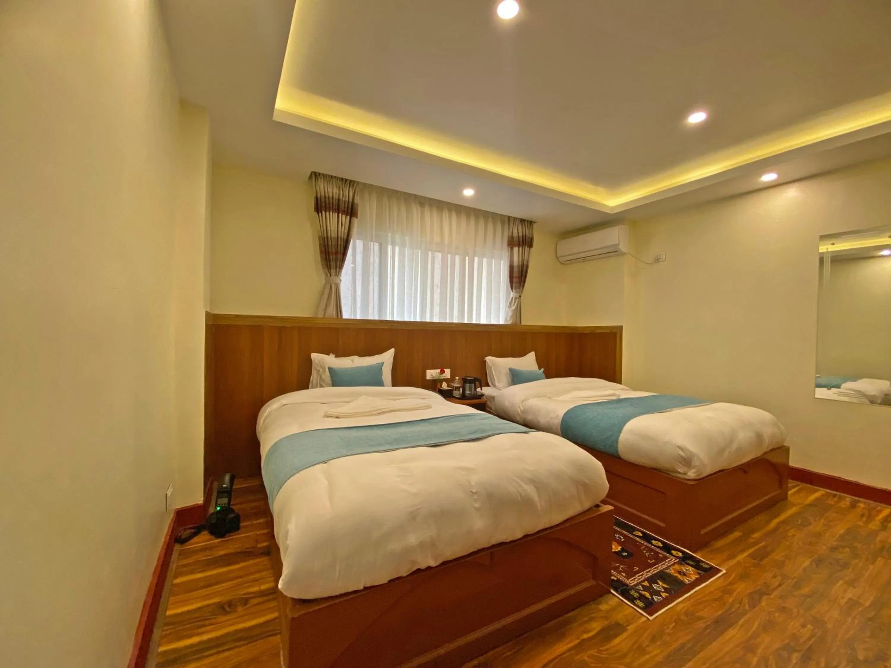 Bed in Hotel Himalayan BTS