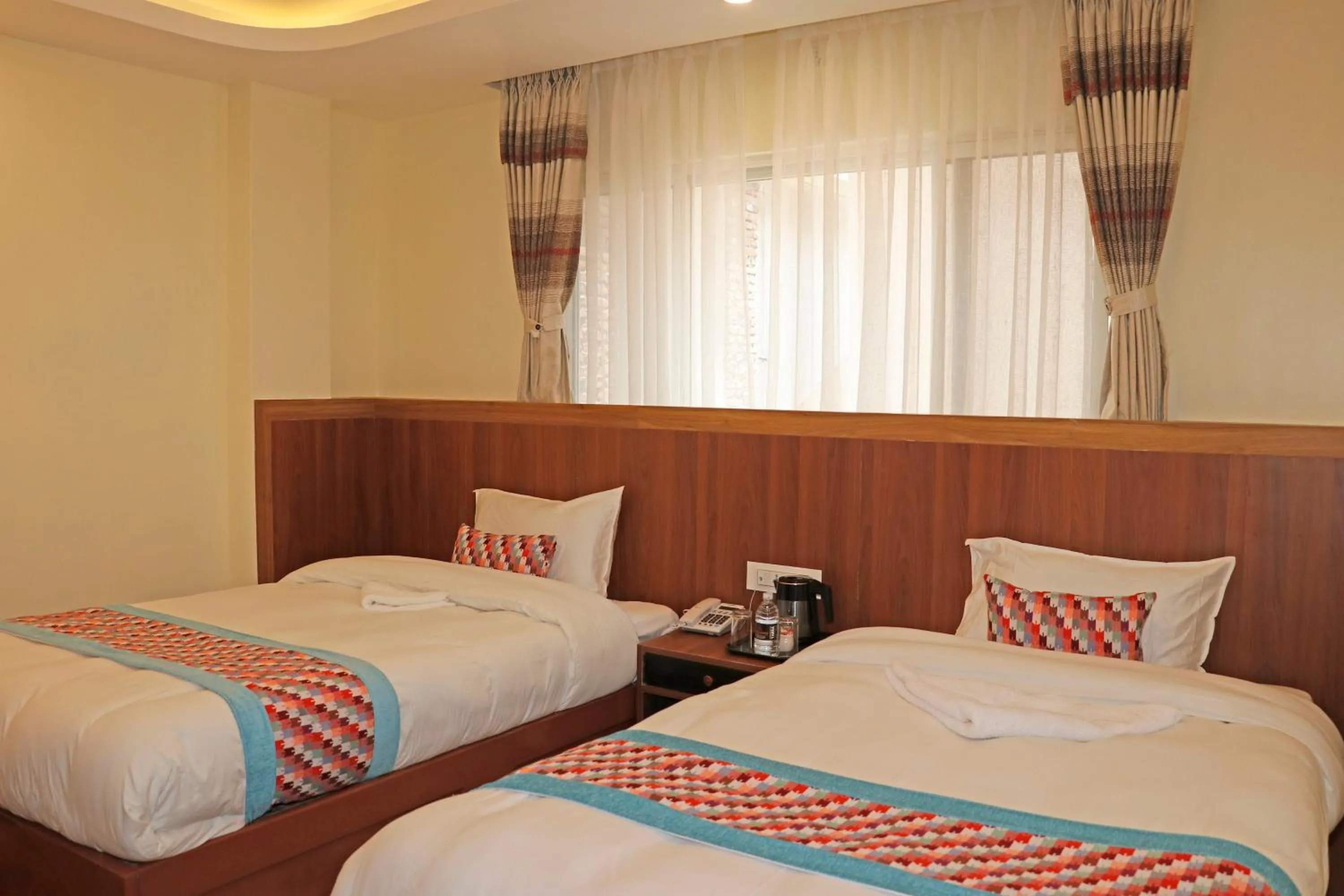 Bed in Hotel Himalayan BTS