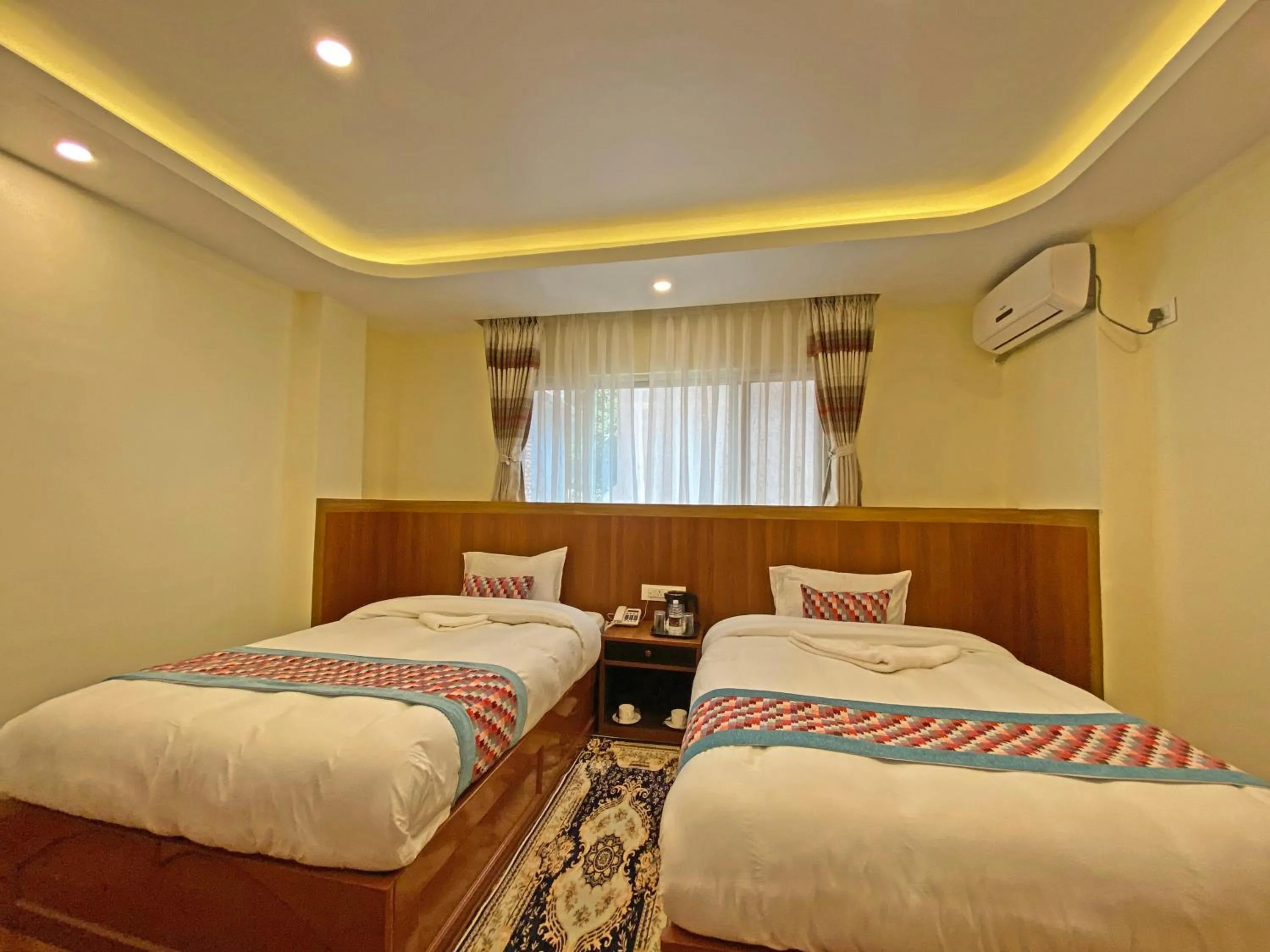 Bed in Hotel Himalayan BTS