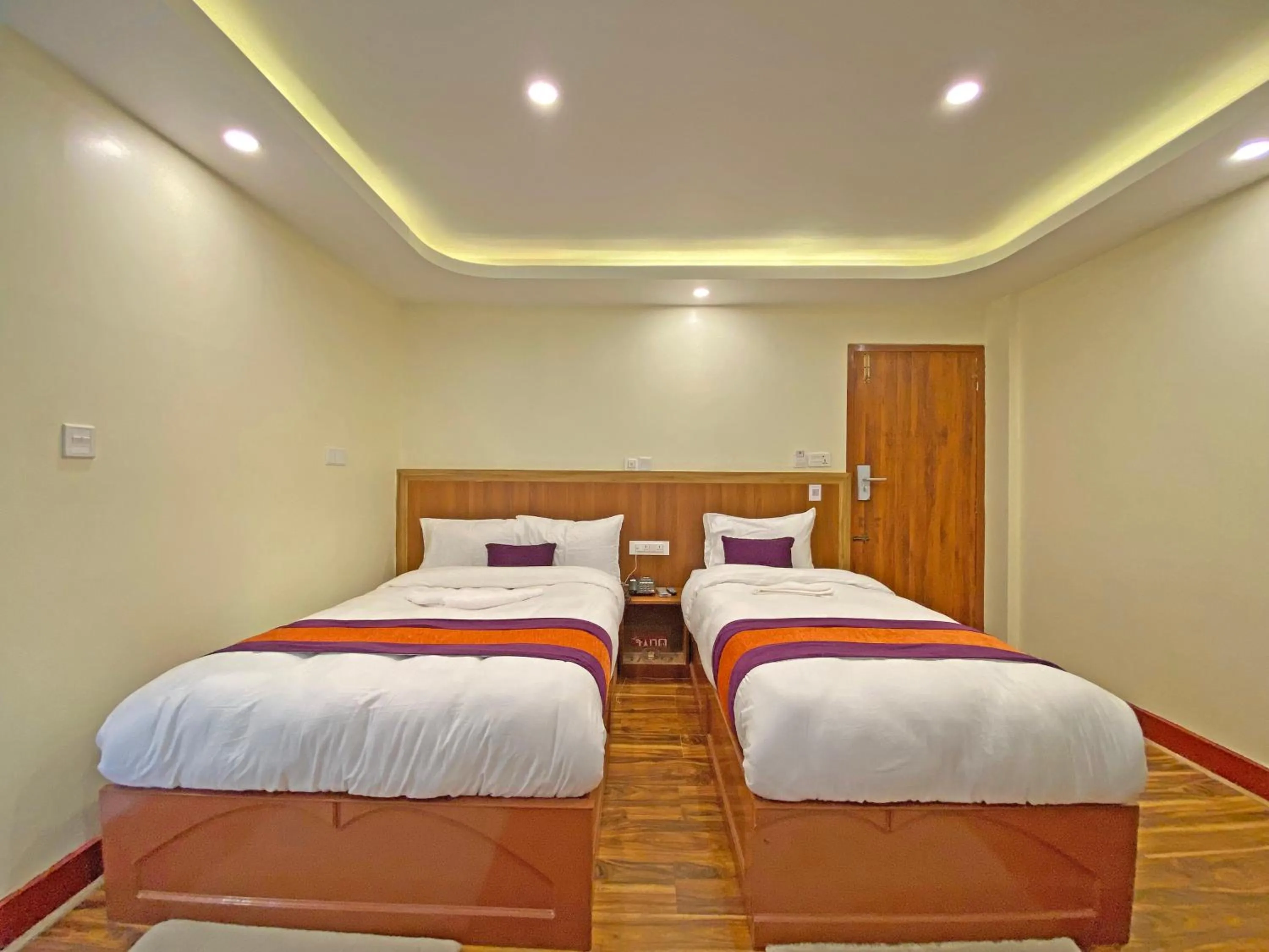 Bed in Hotel Himalayan BTS