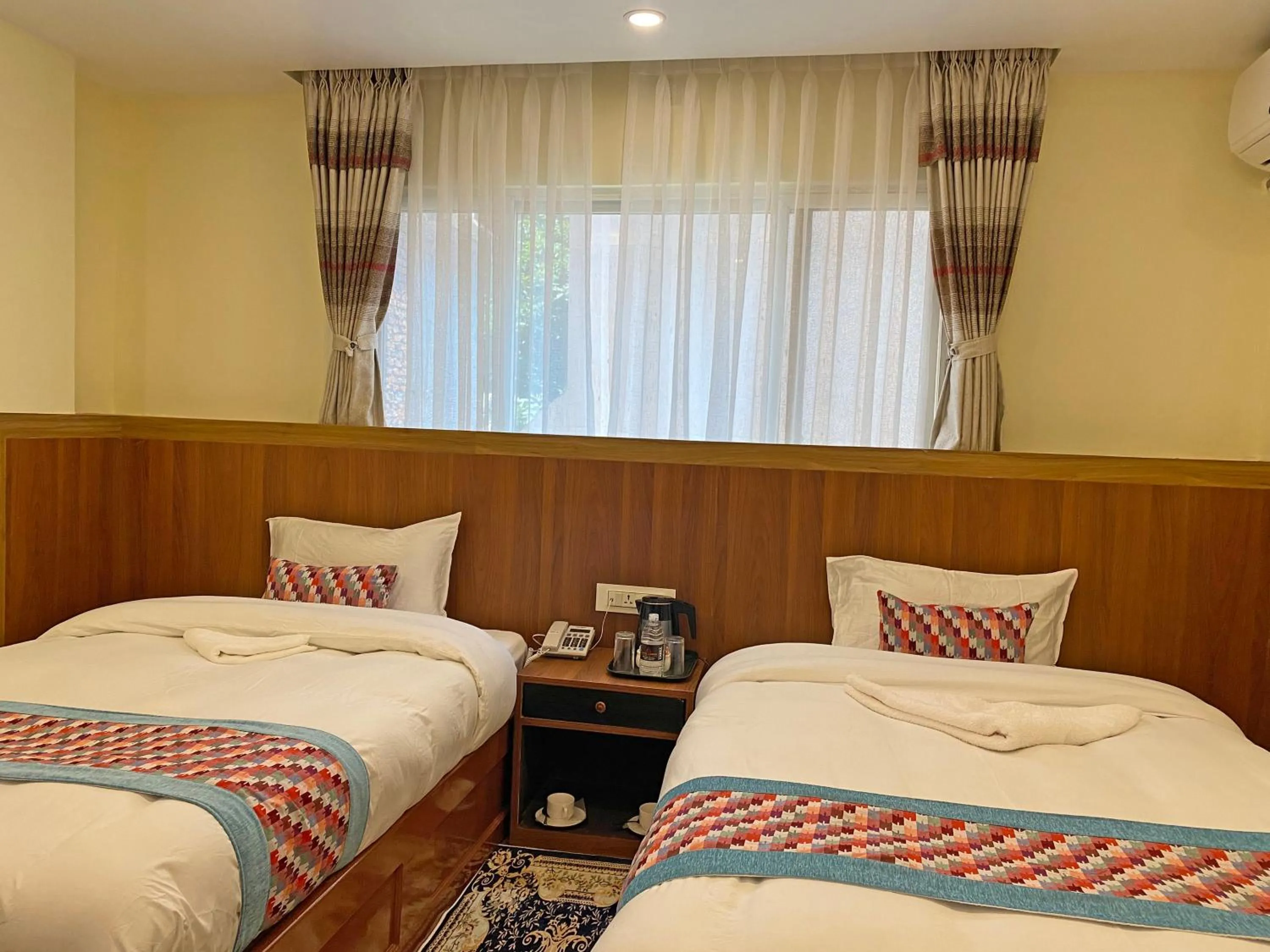 Bed in Hotel Himalayan BTS