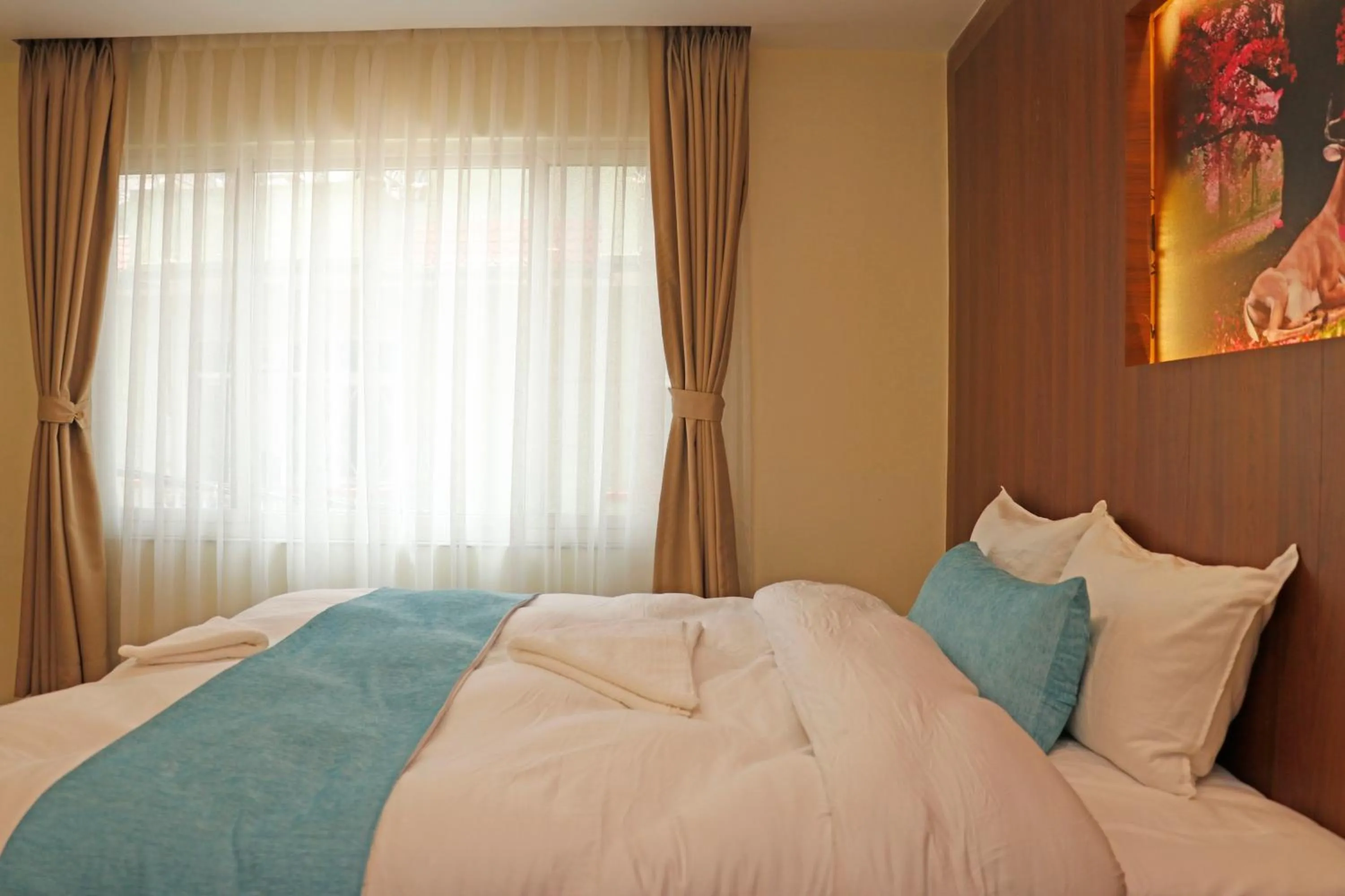 Bed in Hotel Himalayan BTS