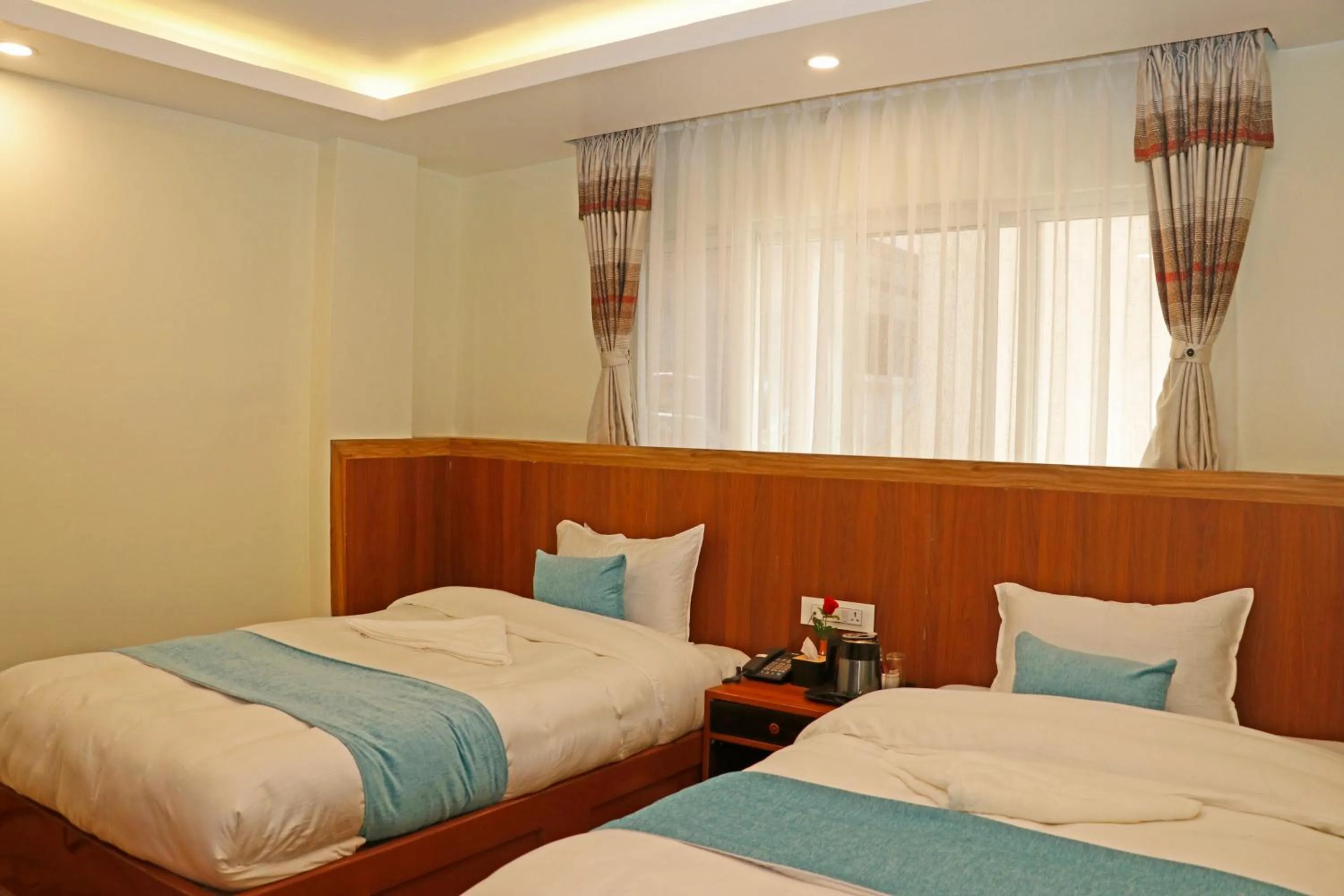 Bed in Hotel Himalayan BTS