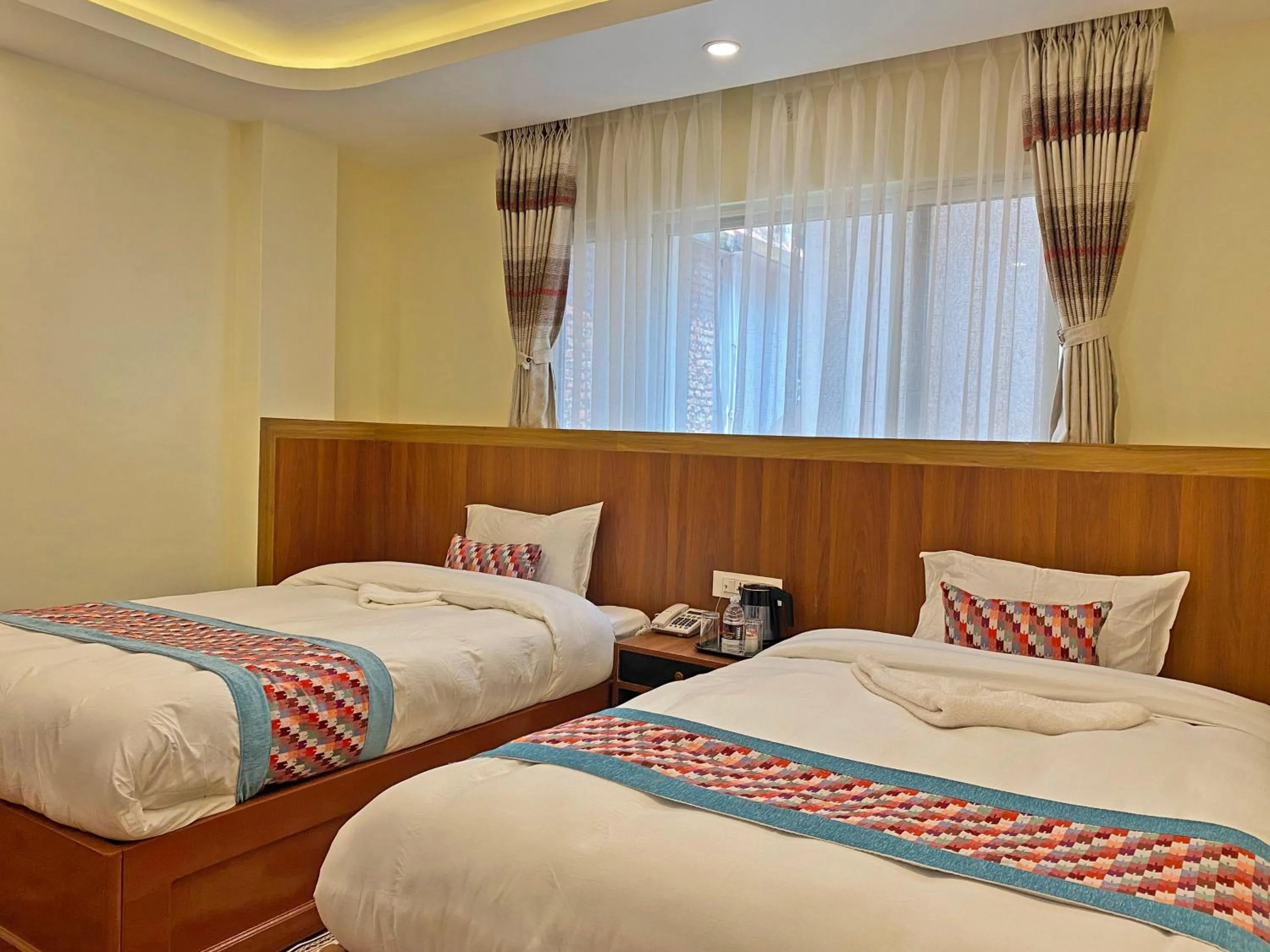 Bed in Hotel Himalayan BTS