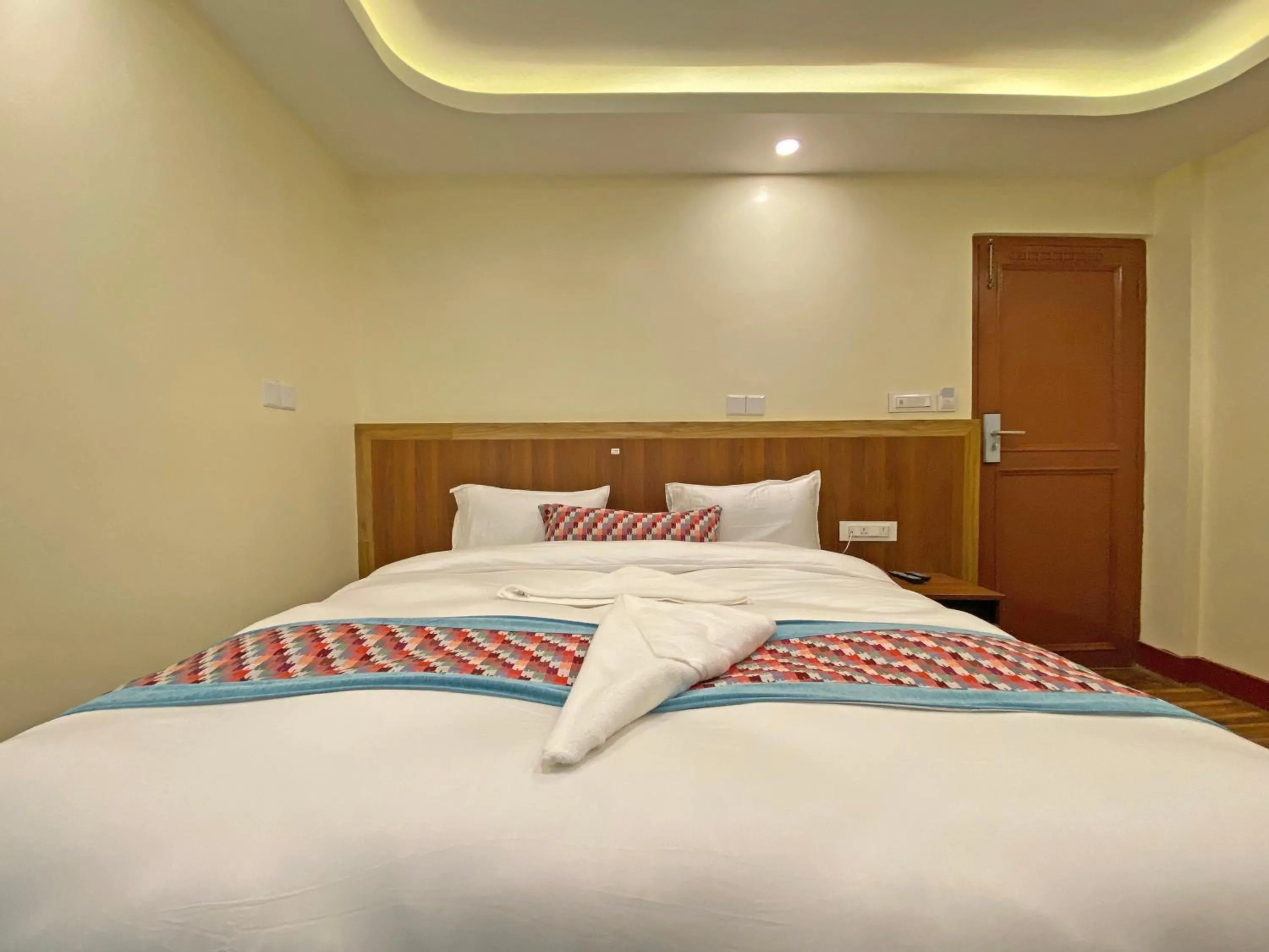 Bed in Hotel Himalayan BTS