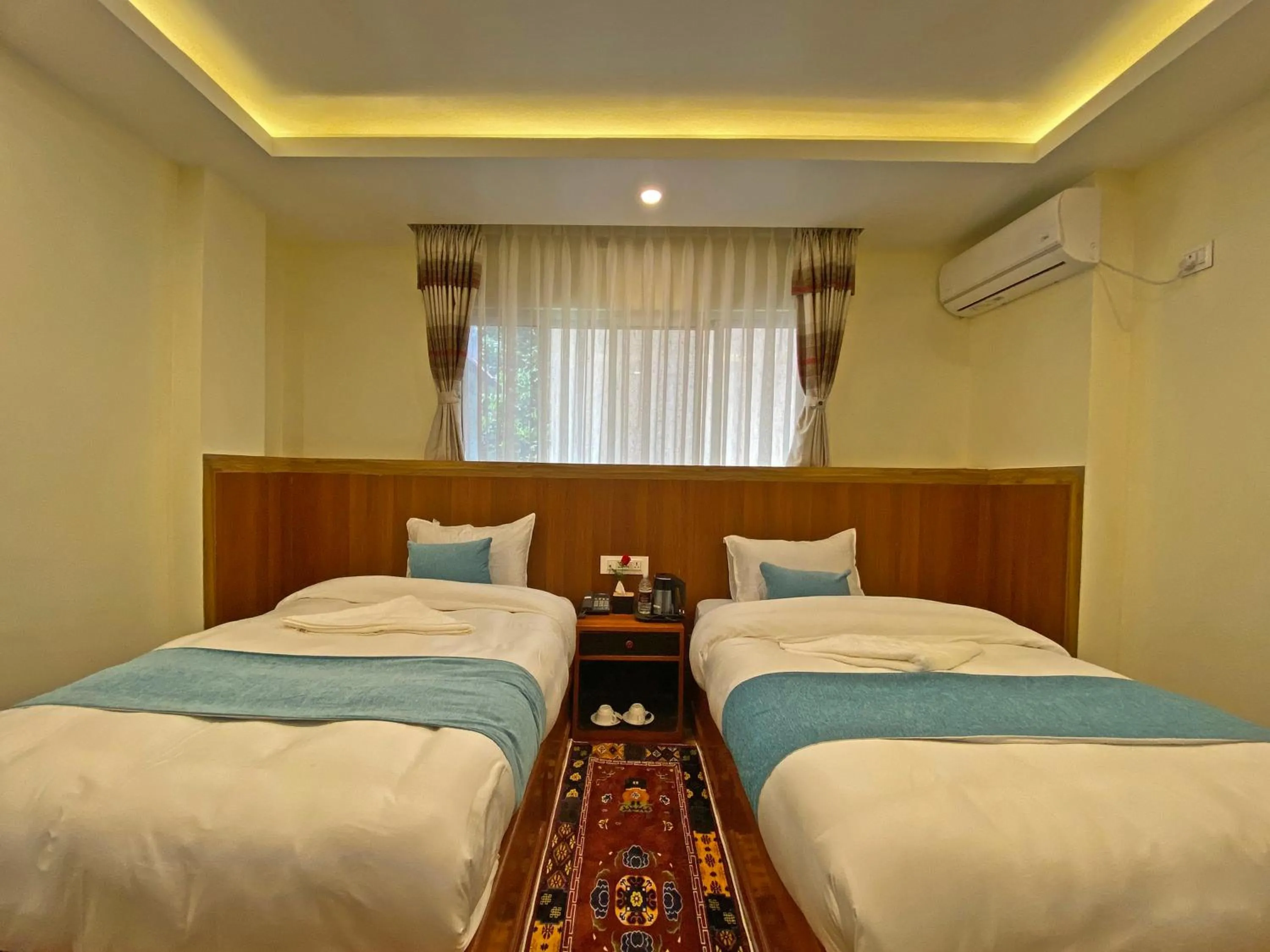 Bed in Hotel Himalayan BTS
