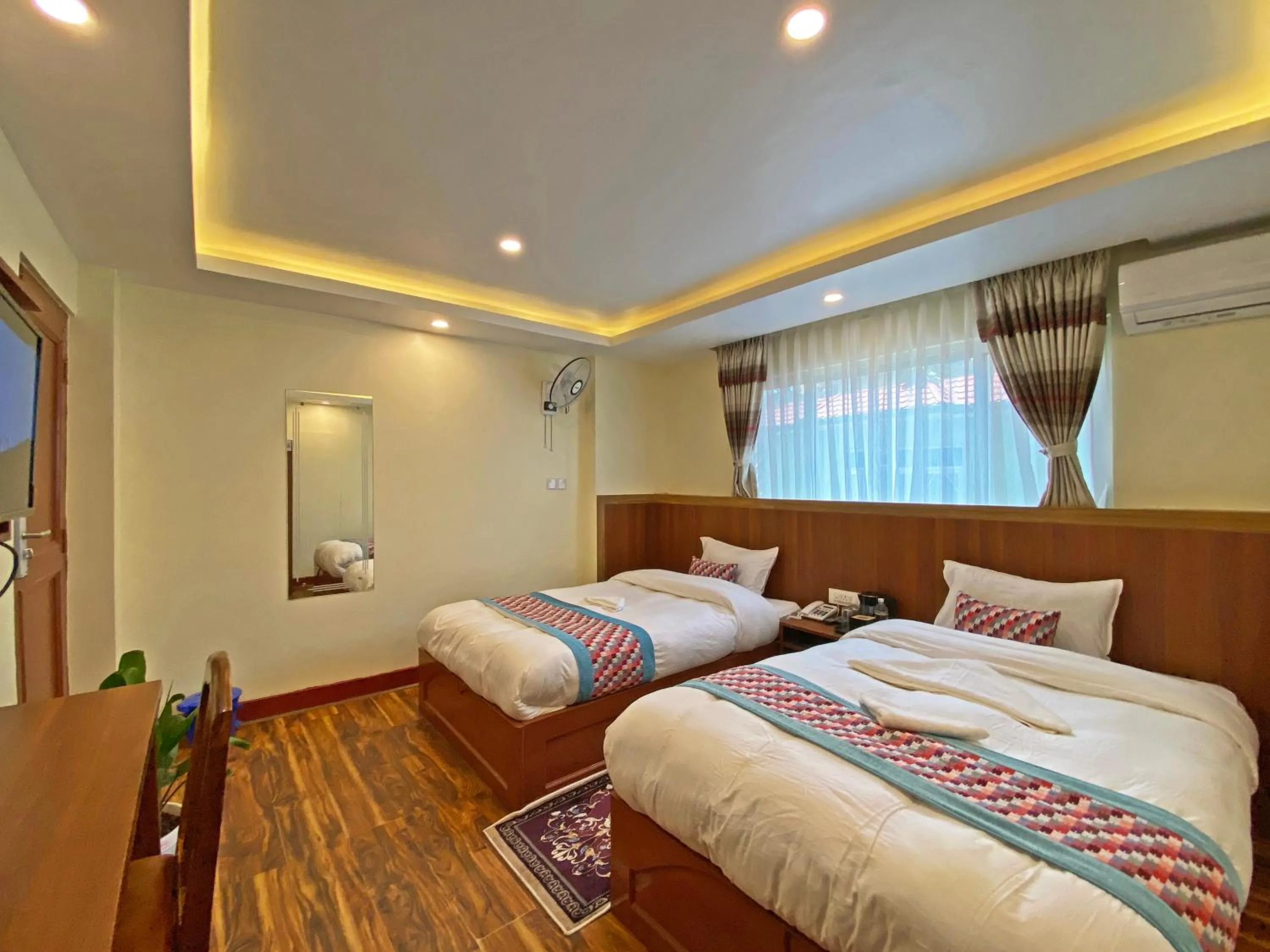 Bed in Hotel Himalayan BTS