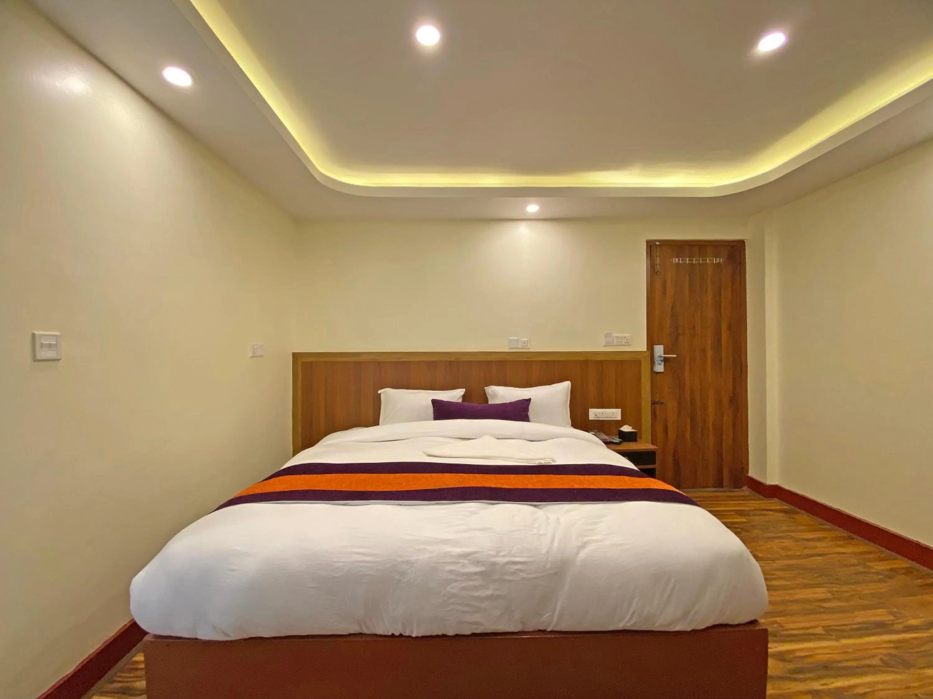 Bed in Hotel Himalayan BTS