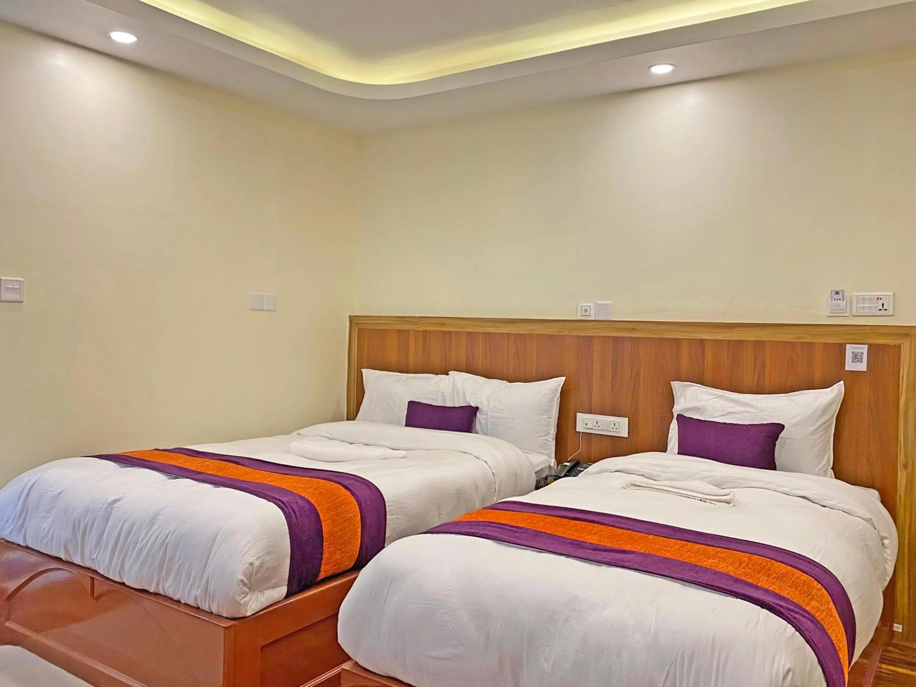 Bed in Hotel Himalayan BTS