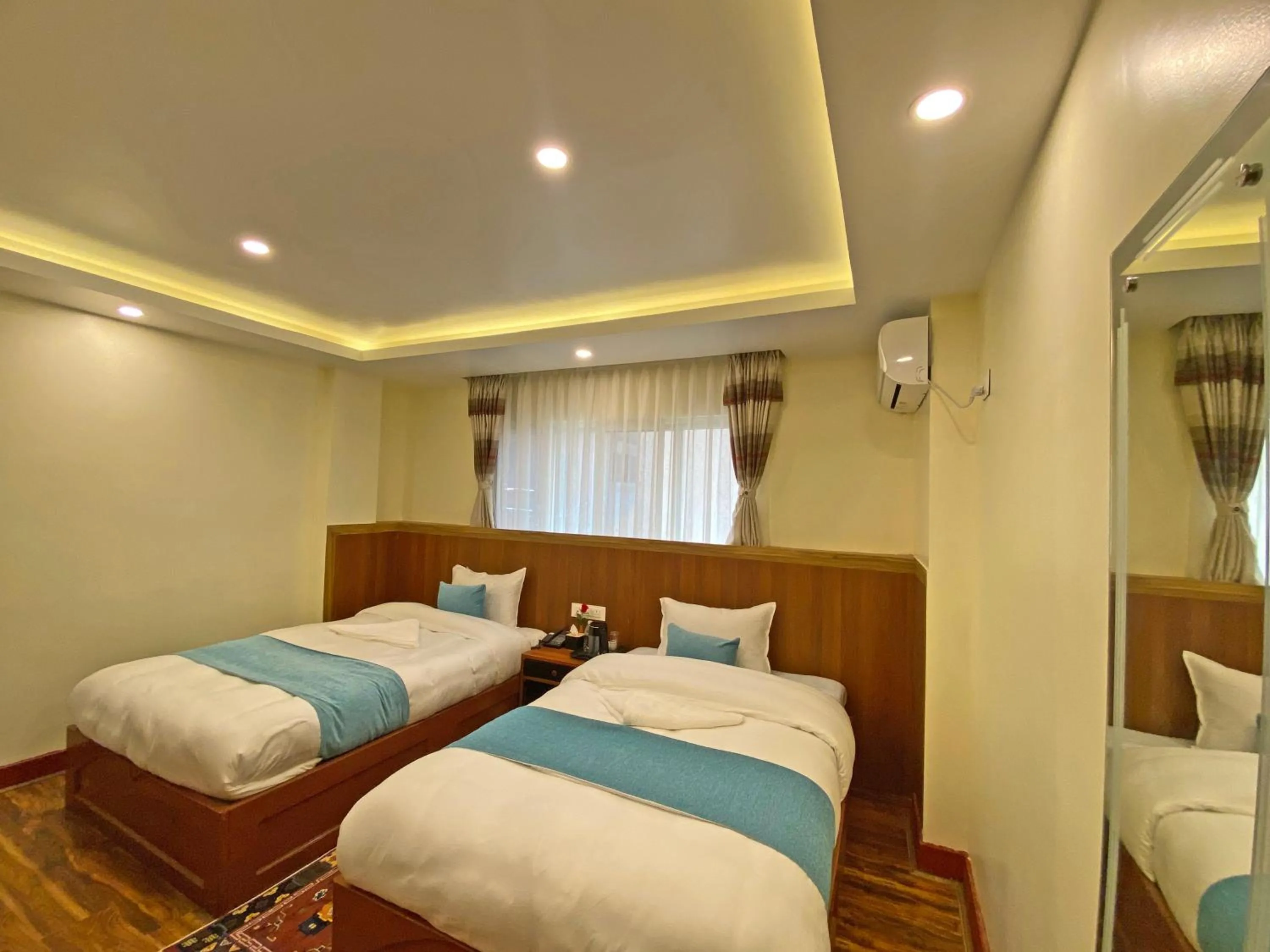 Bed in Hotel Himalayan BTS