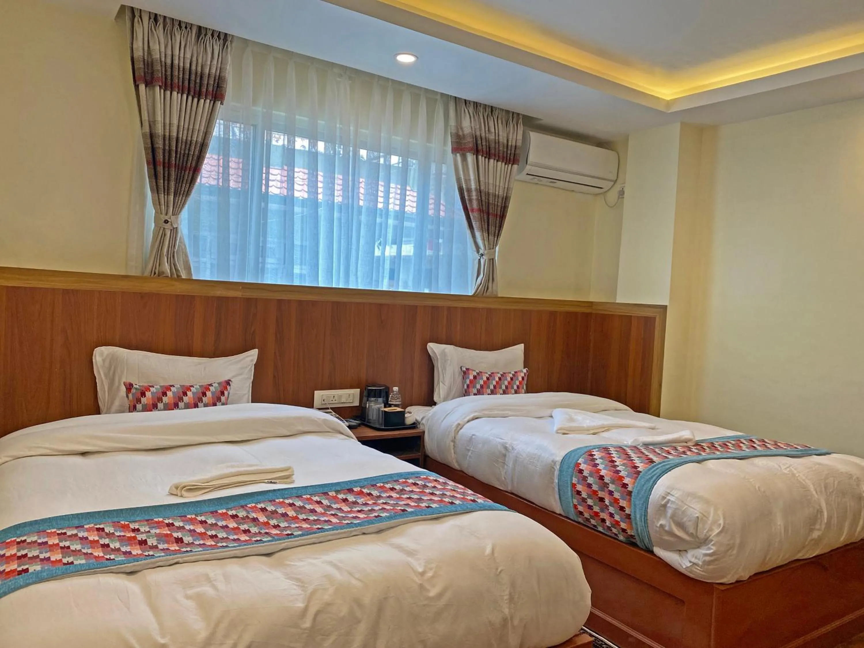 Bed in Hotel Himalayan BTS