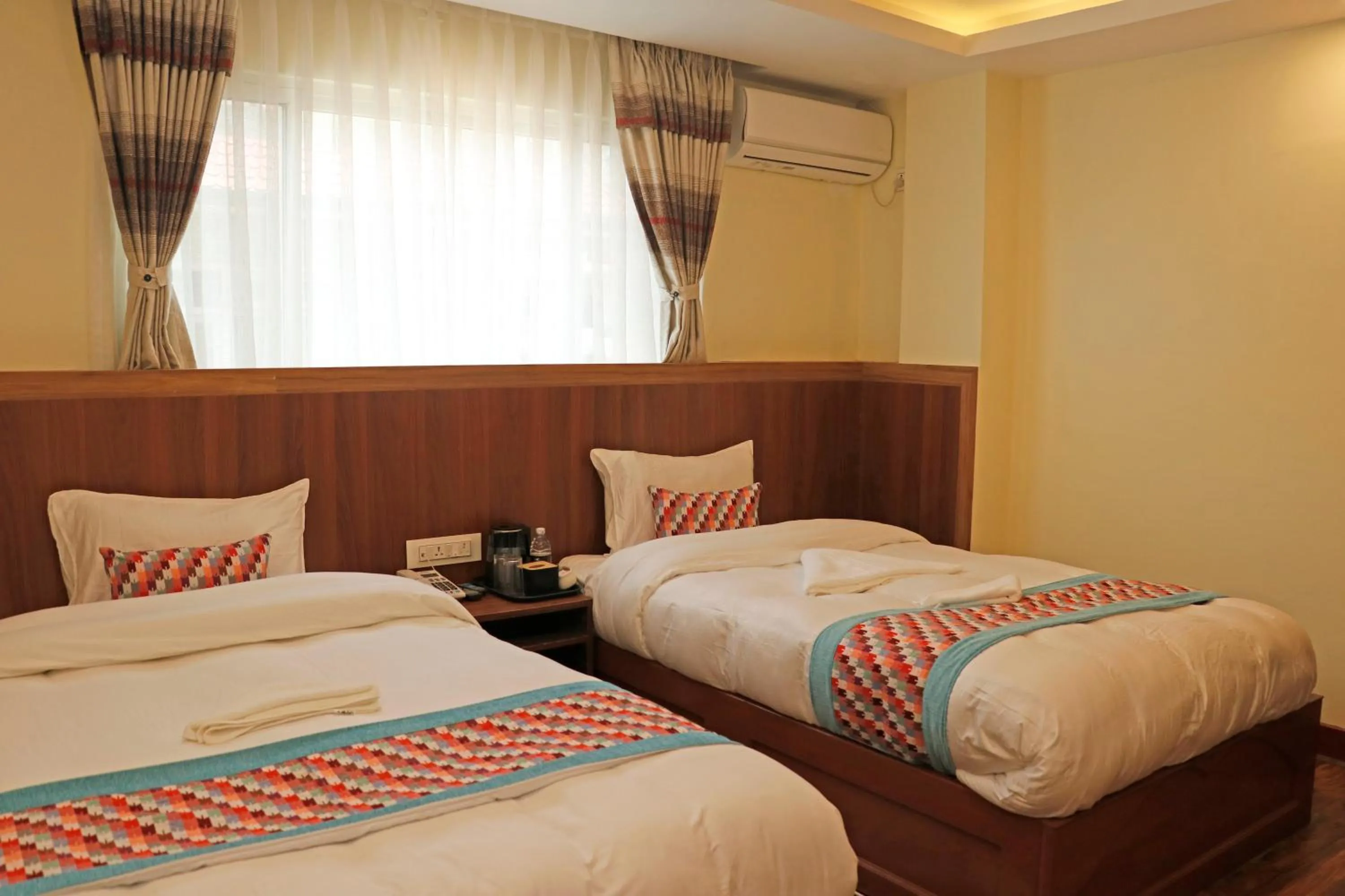 Bed in Hotel Himalayan BTS