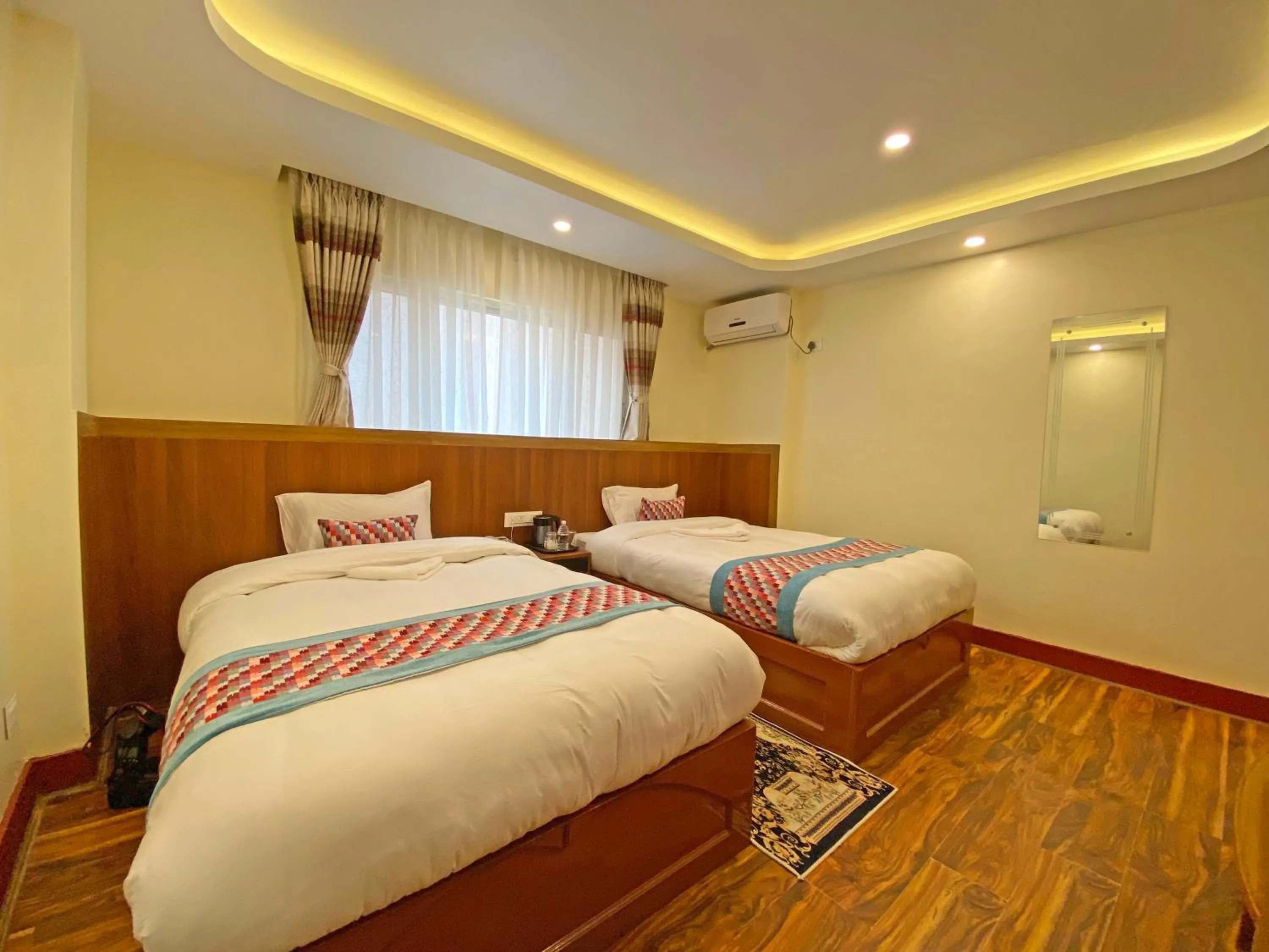 Bed in Hotel Himalayan BTS
