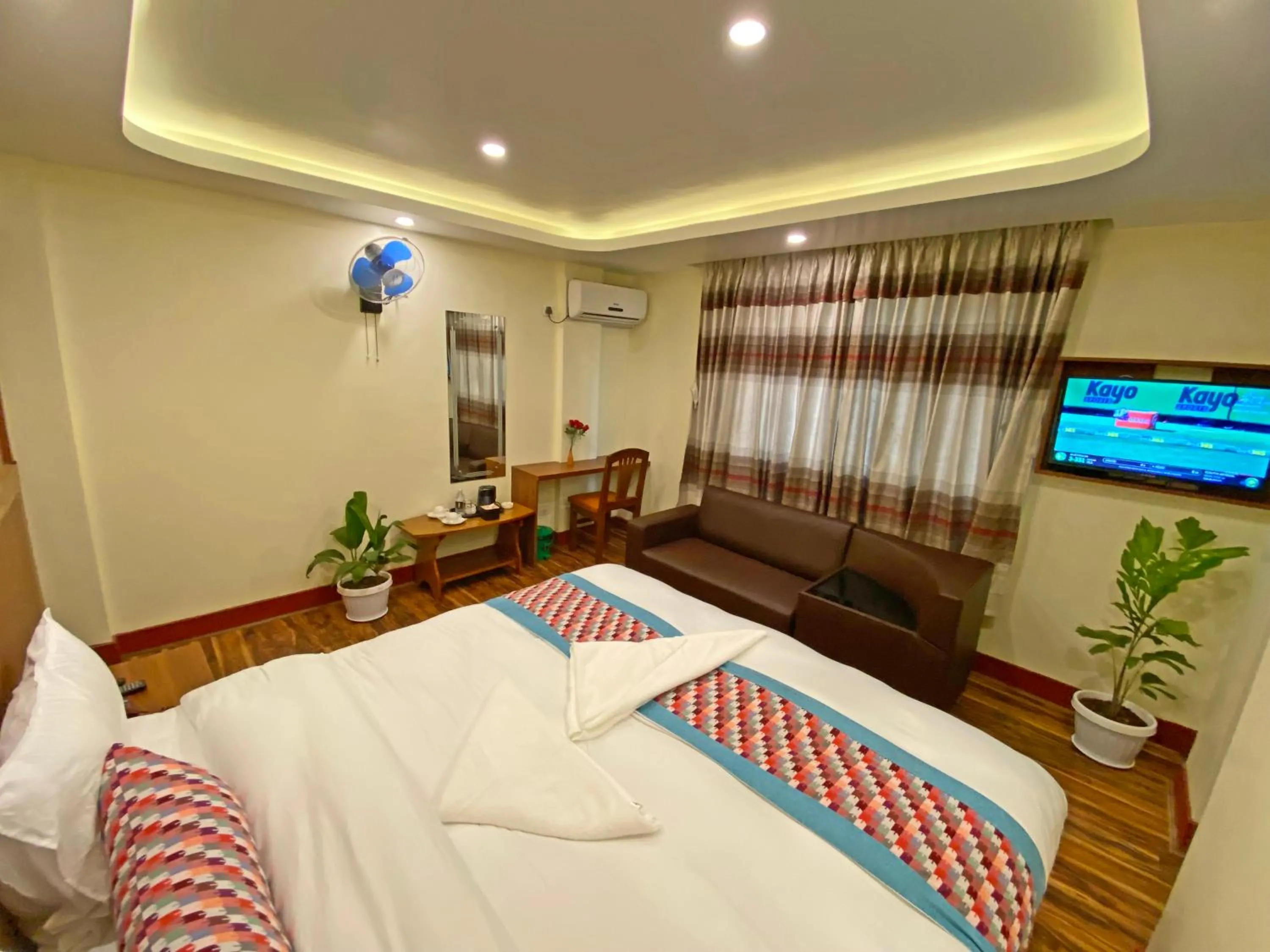 Bed in Hotel Himalayan BTS