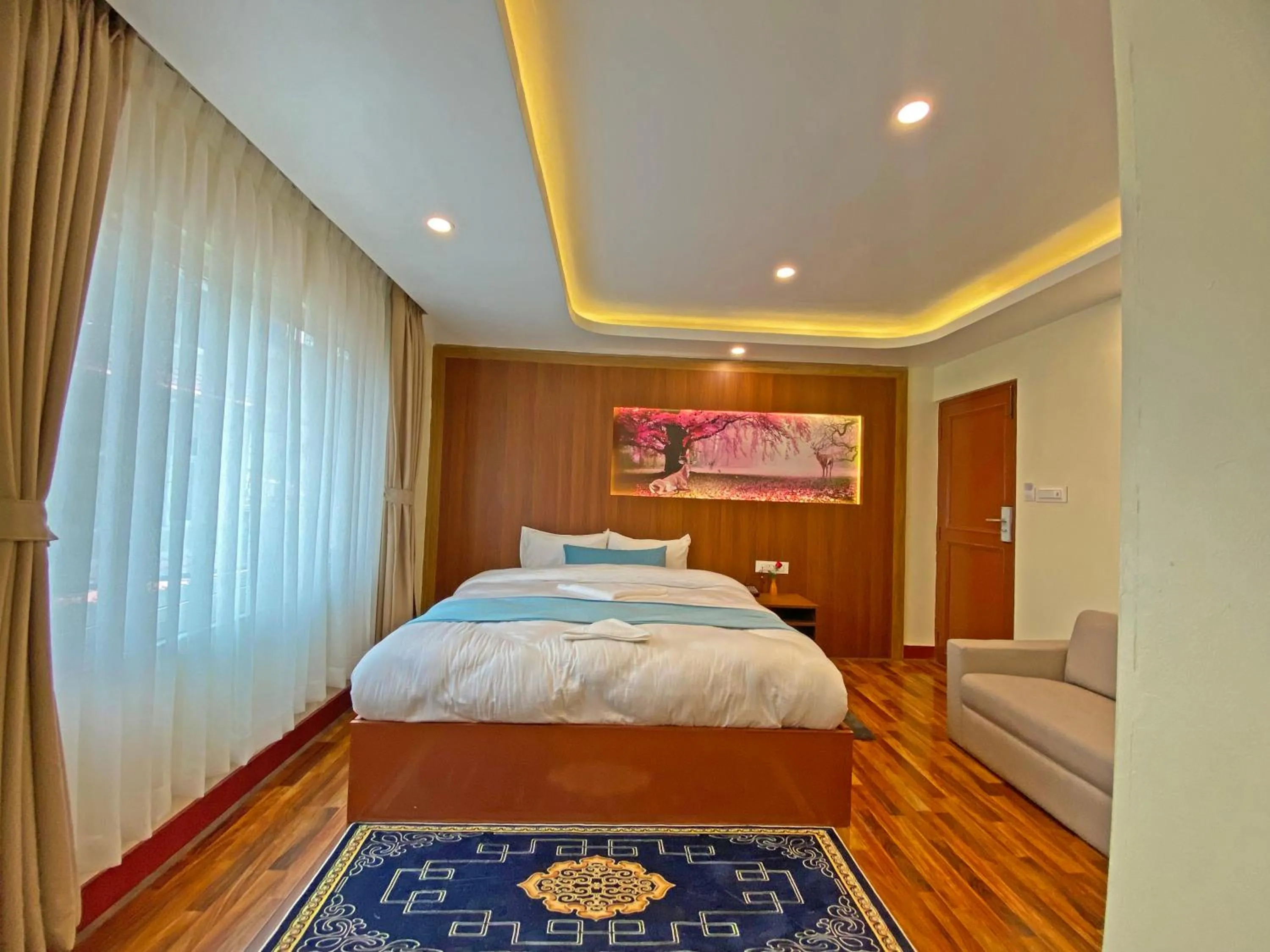 Bed in Hotel Himalayan BTS