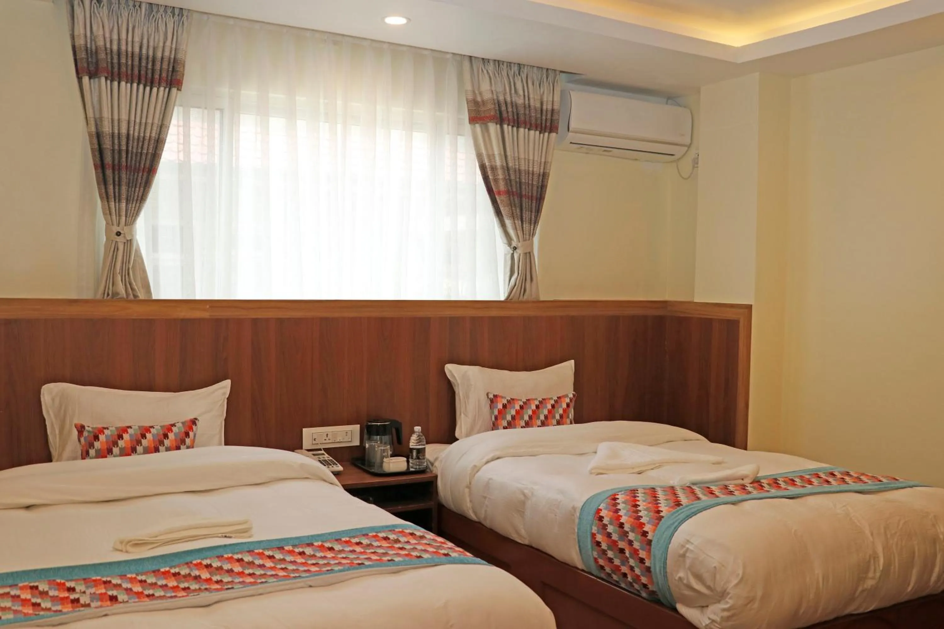 Bed in Hotel Himalayan BTS
