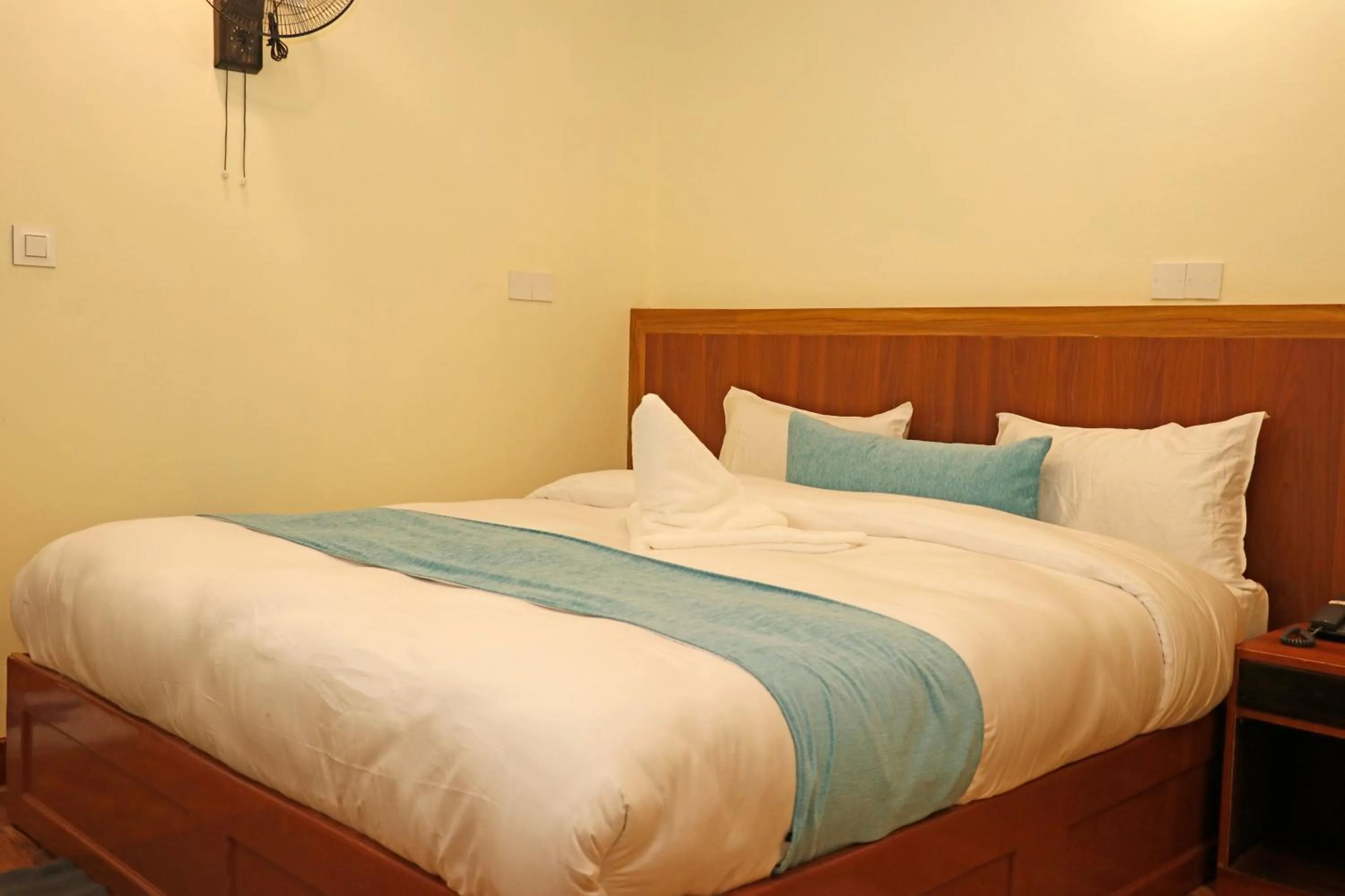 Bed in Hotel Himalayan BTS