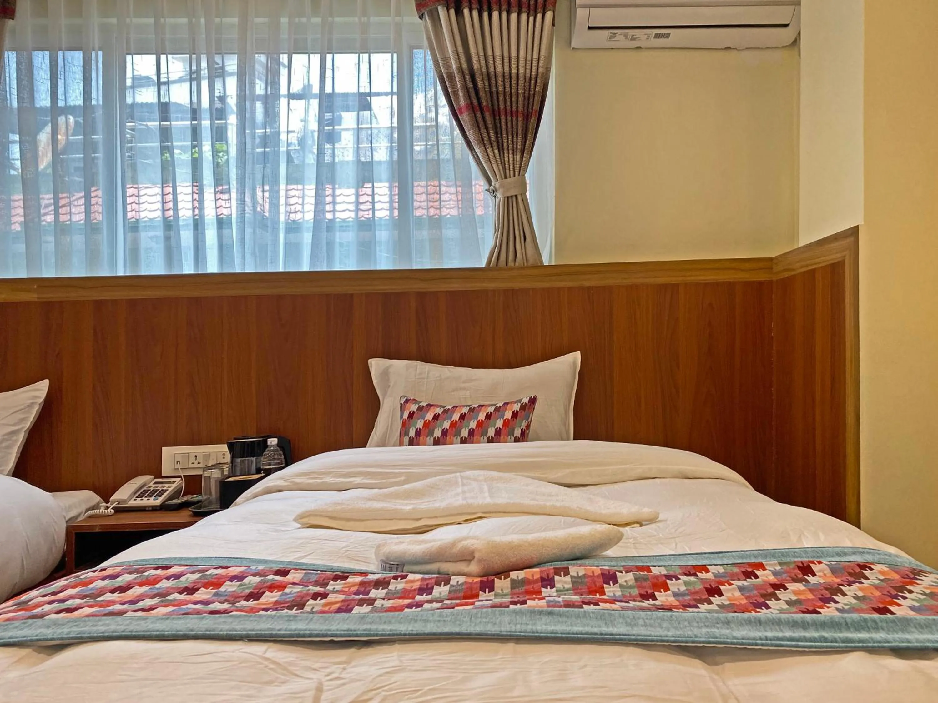 Bed in Hotel Himalayan BTS