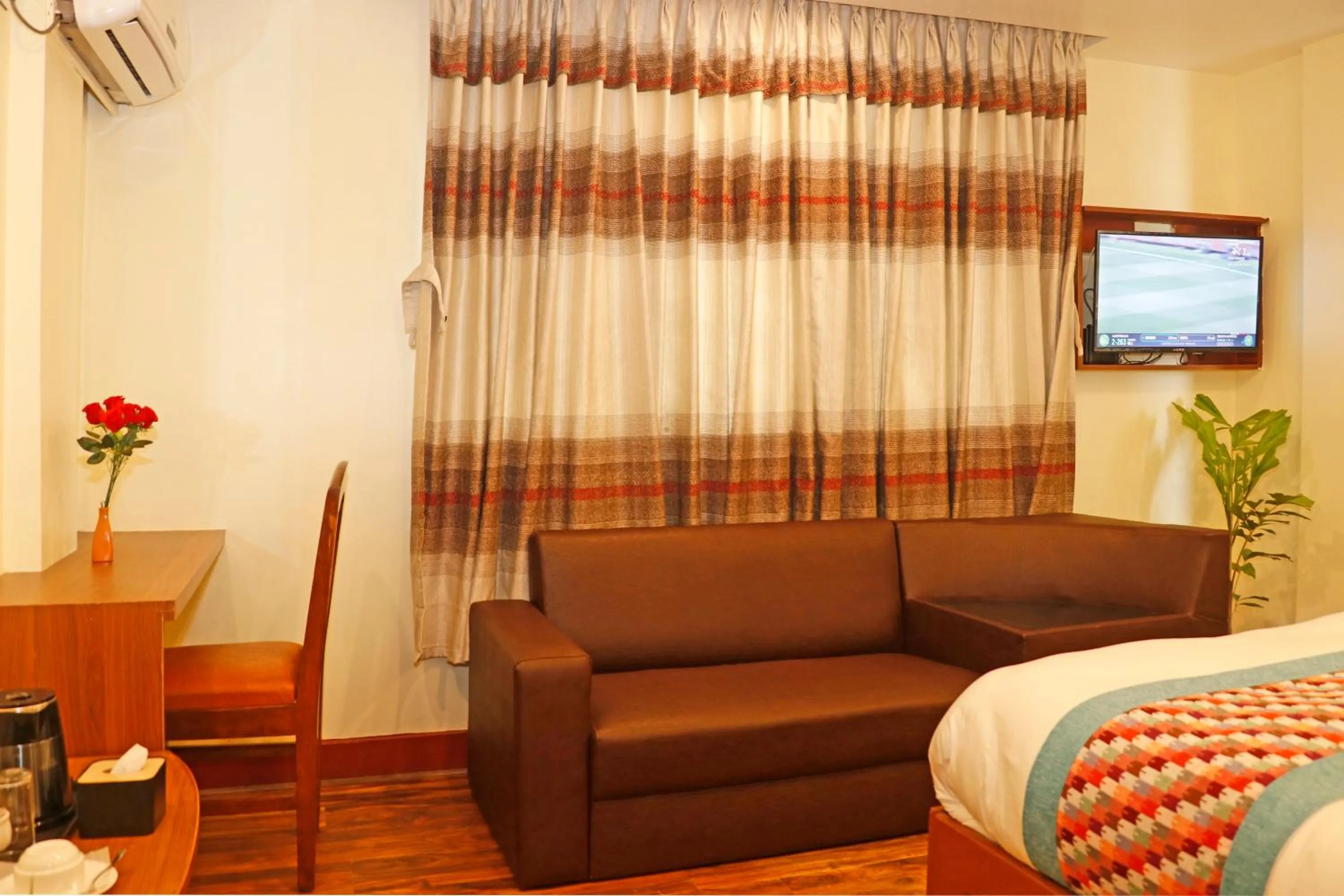 Bed in Hotel Himalayan BTS