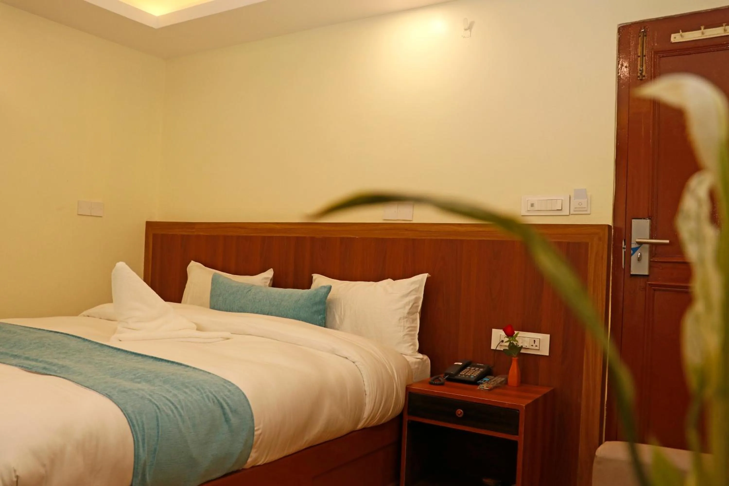 Bed in Hotel Himalayan BTS